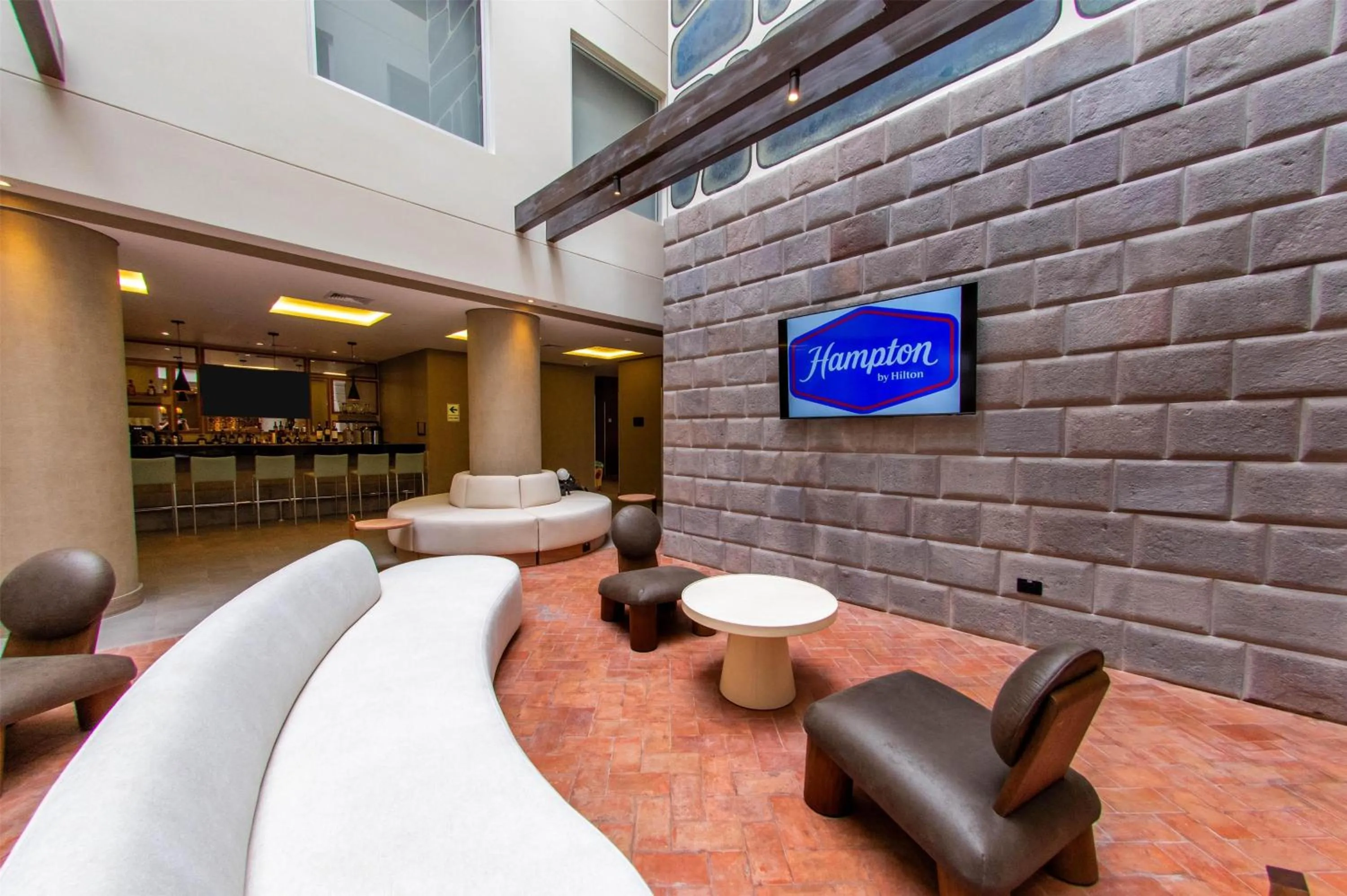 Communal lounge/ TV room in Hampton By Hilton Cusco