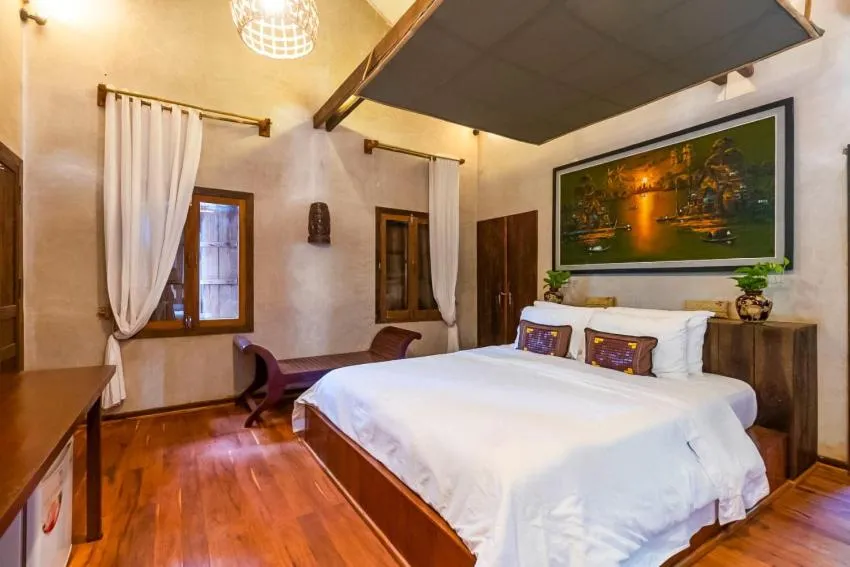 Bed in Maison Model d'Angkor