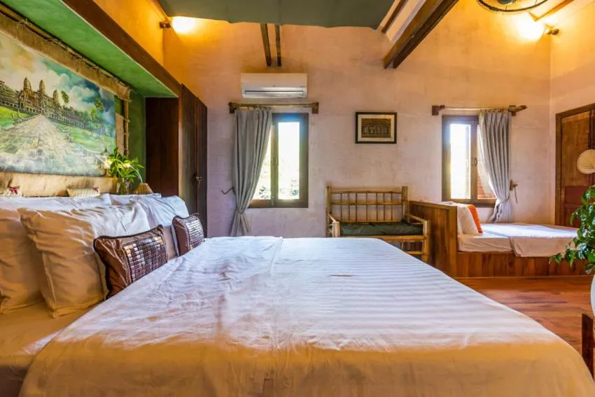 Bed in Maison Model d'Angkor