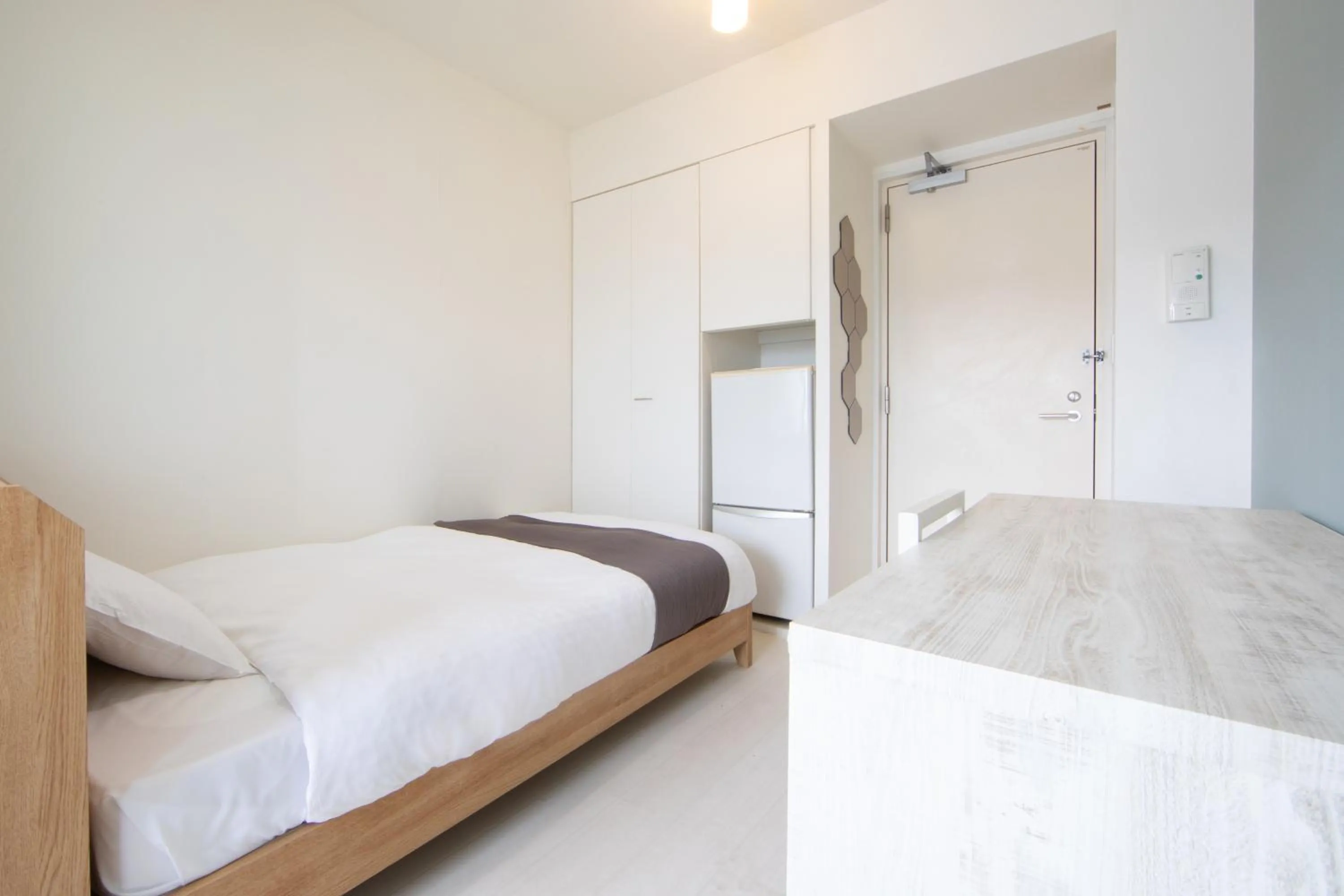 Bed in E-horizon Resort Condominium Sesoko