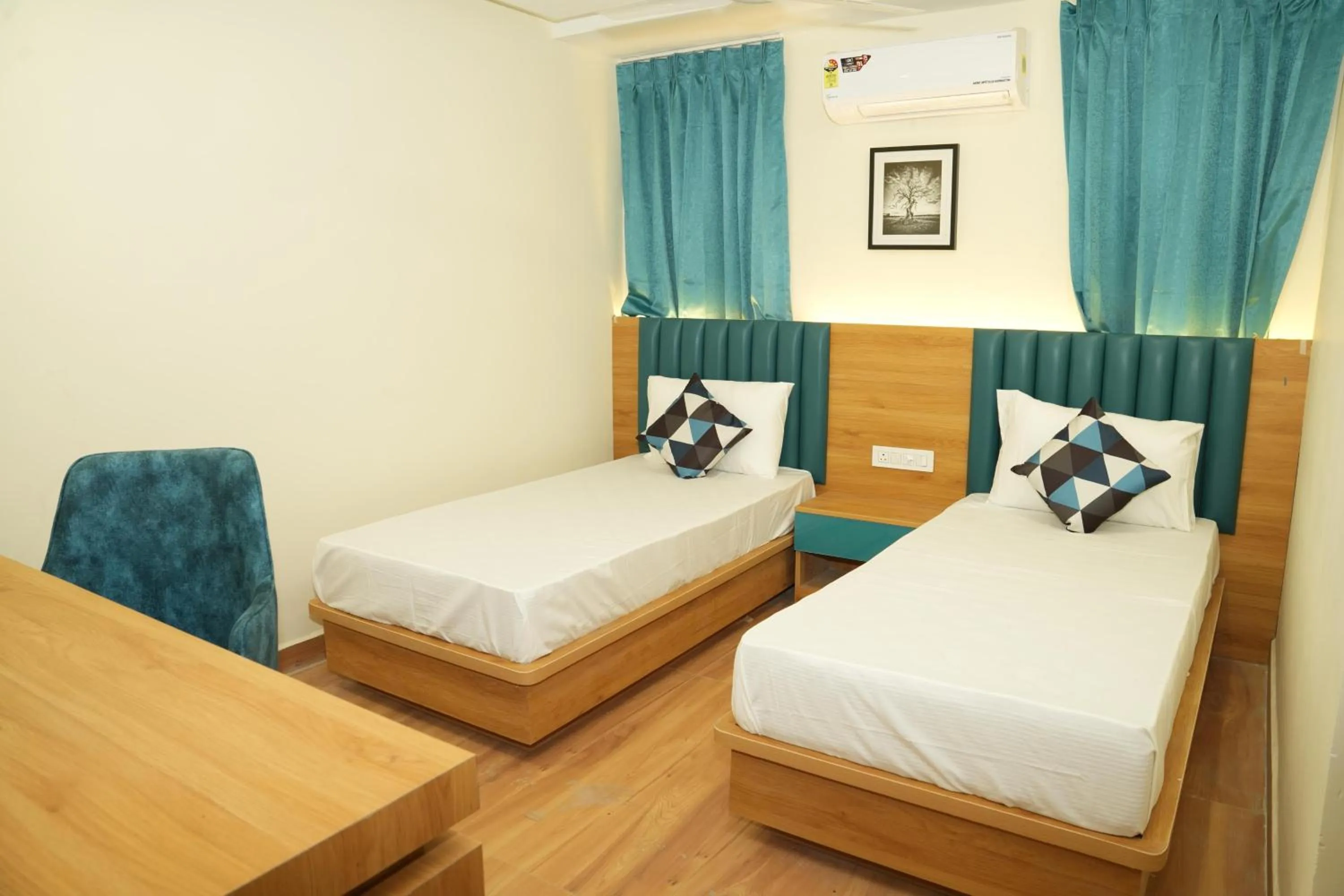 Bedroom, Bed in White Ridge Premium Hotel - Hitec City