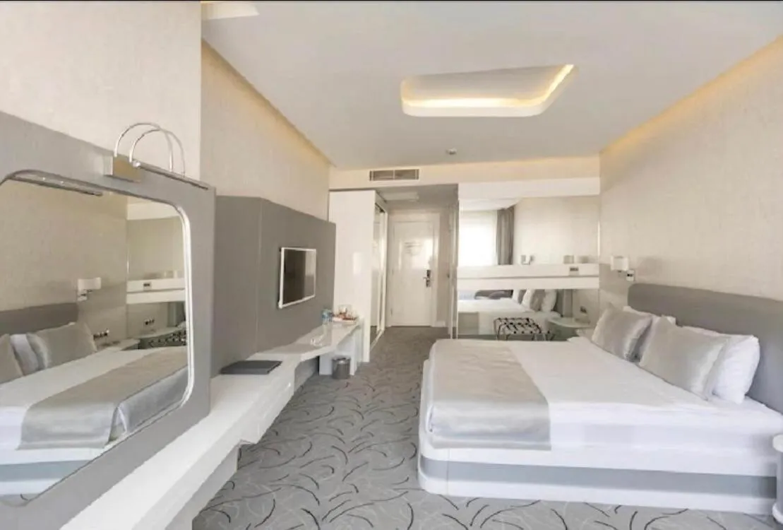 Bed in White Line Boutique Hotel