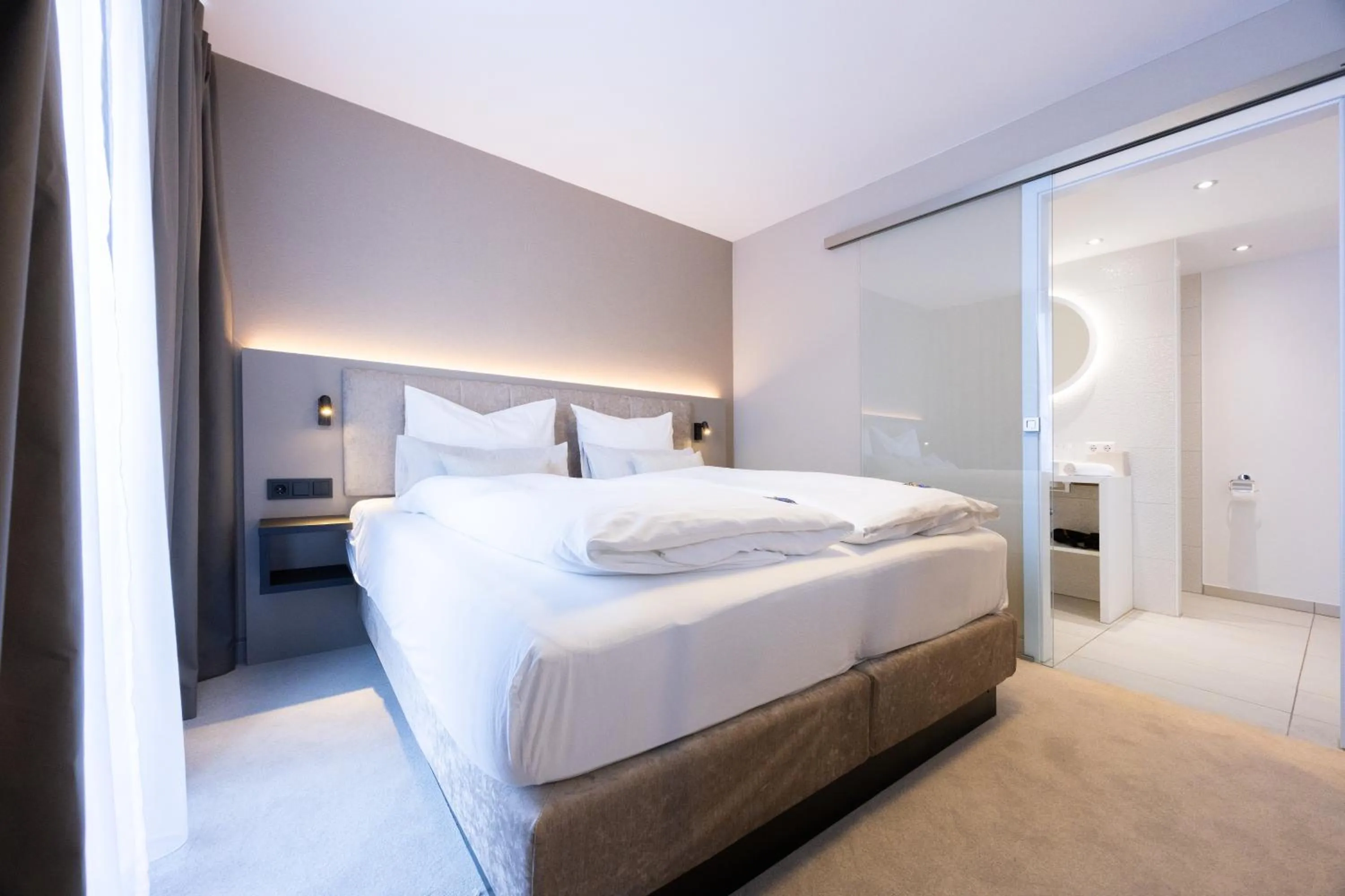 Bed in Digital Hotel Kronjuwel by BRIGHT Waldkirch - Self Check-in