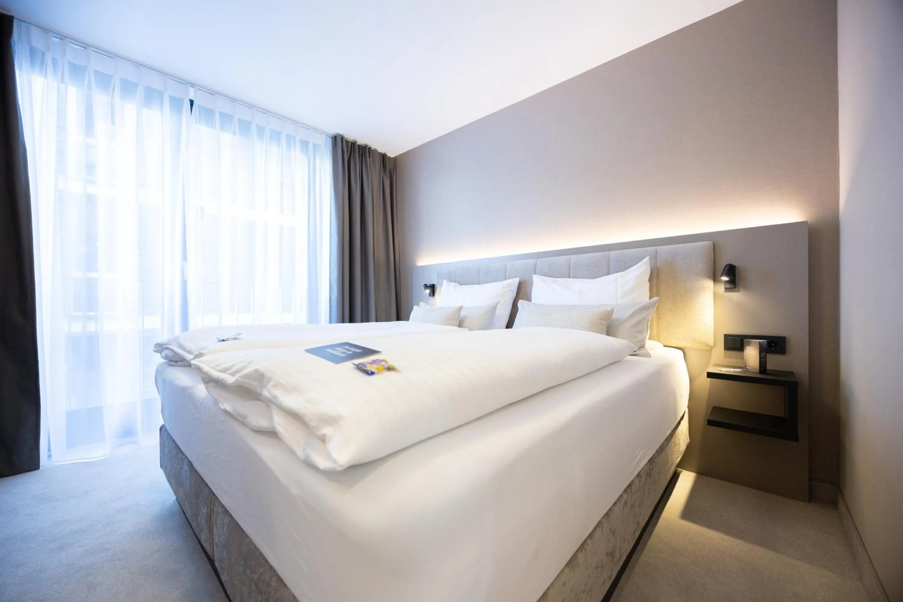 Bed in Digital Hotel Kronjuwel by BRIGHT Waldkirch - Self Check-in