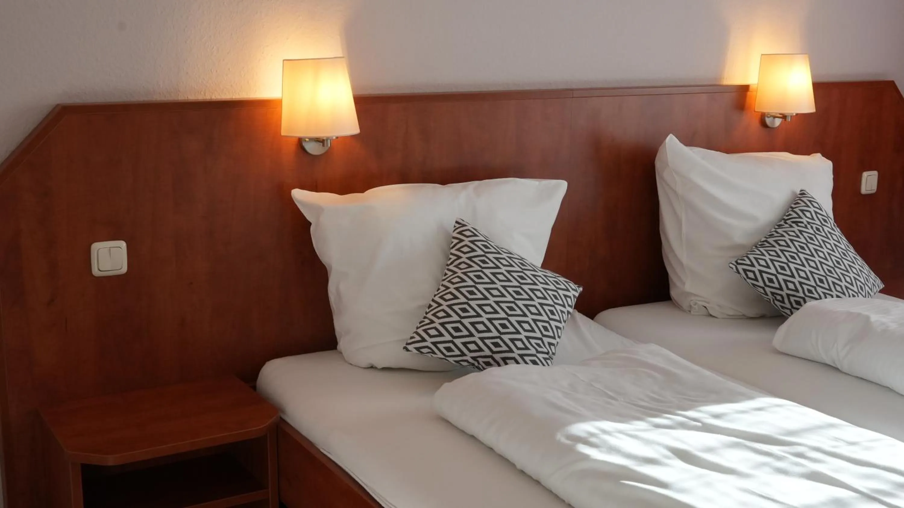 Bed in Gästehaus Tilly Hotel