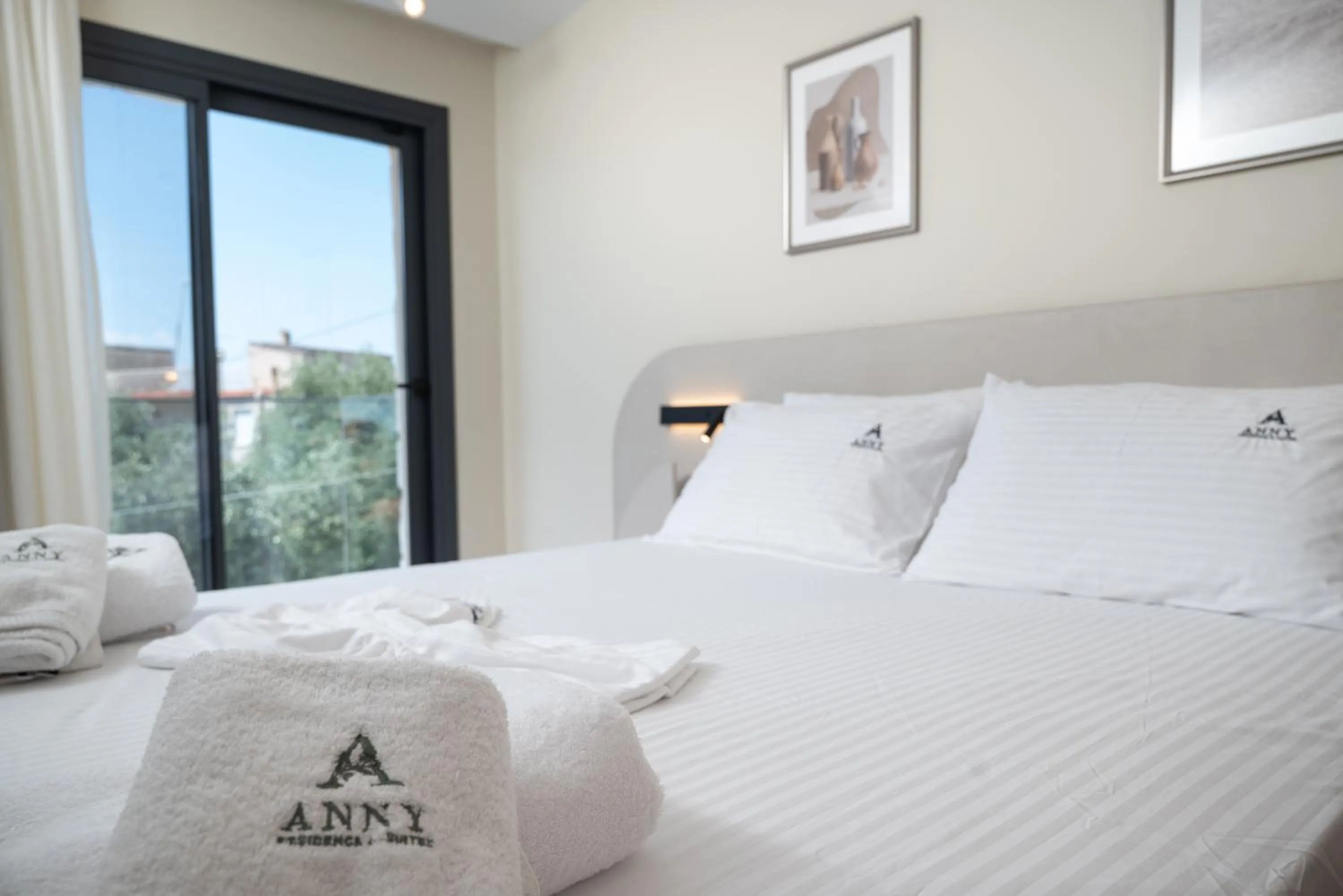 Bed in Anny's Residences & Suites