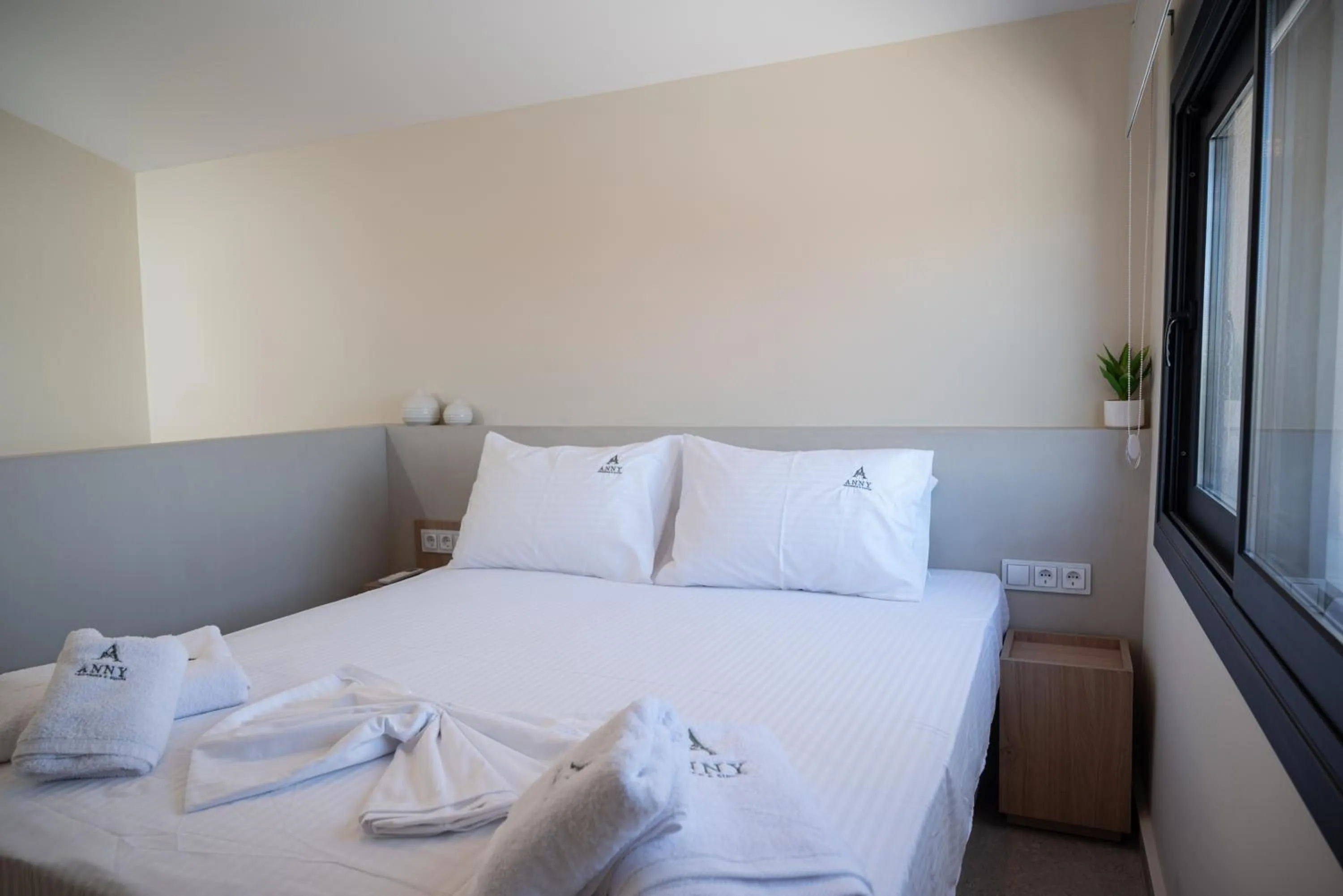 Bed in Anny's Residences & Suites