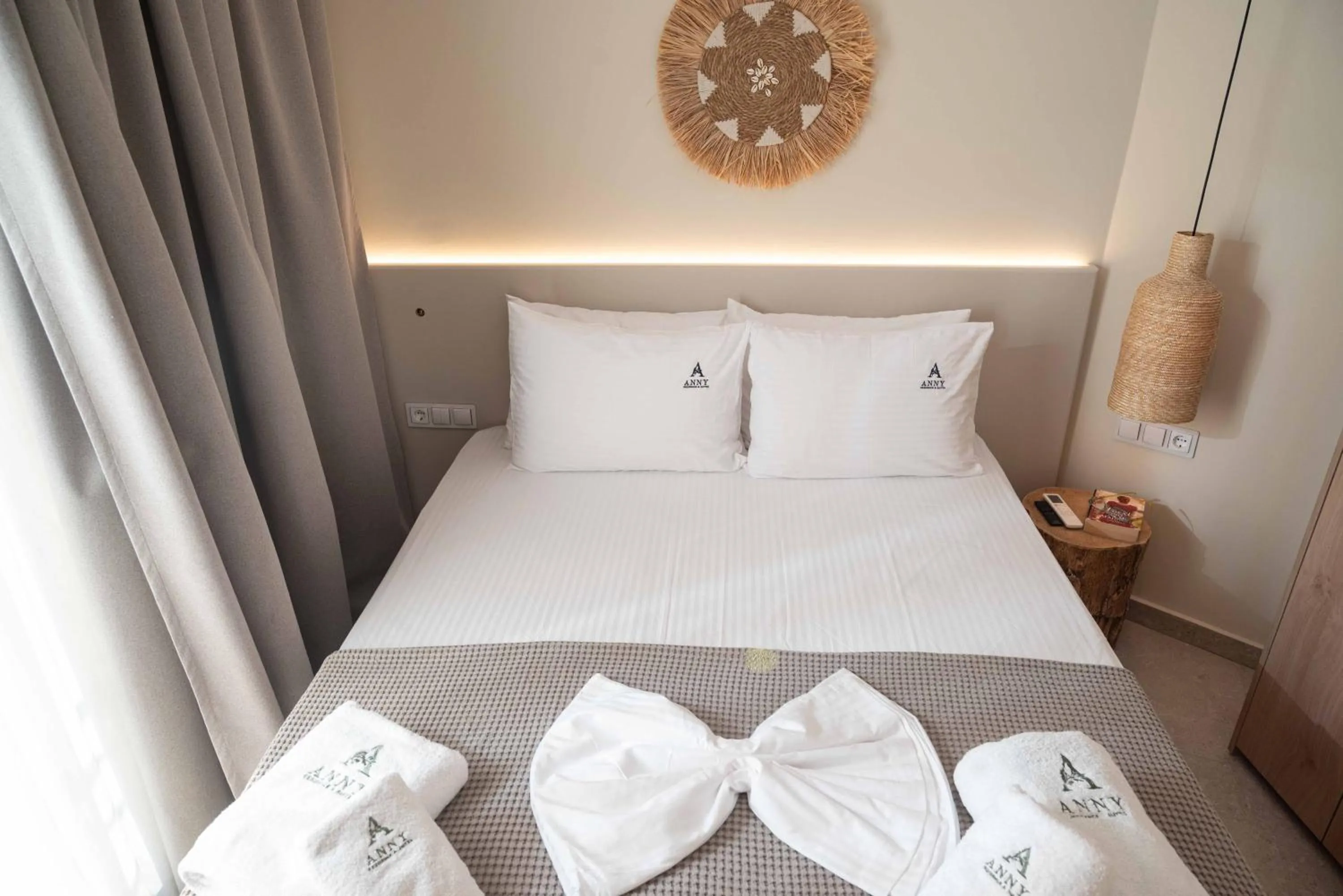 Bed in Anny's Residences & Suites