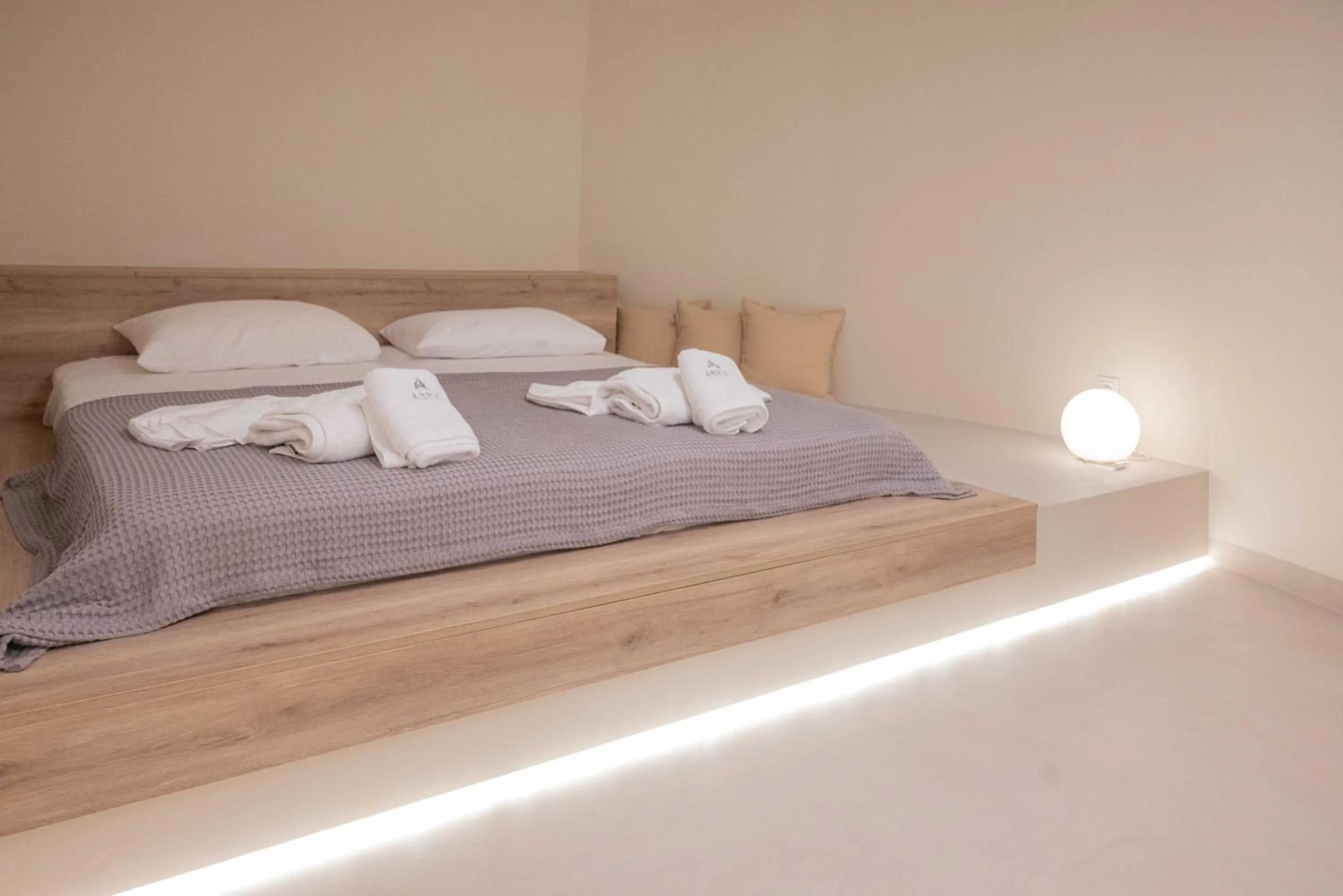 Bed in Anny's Residences & Suites