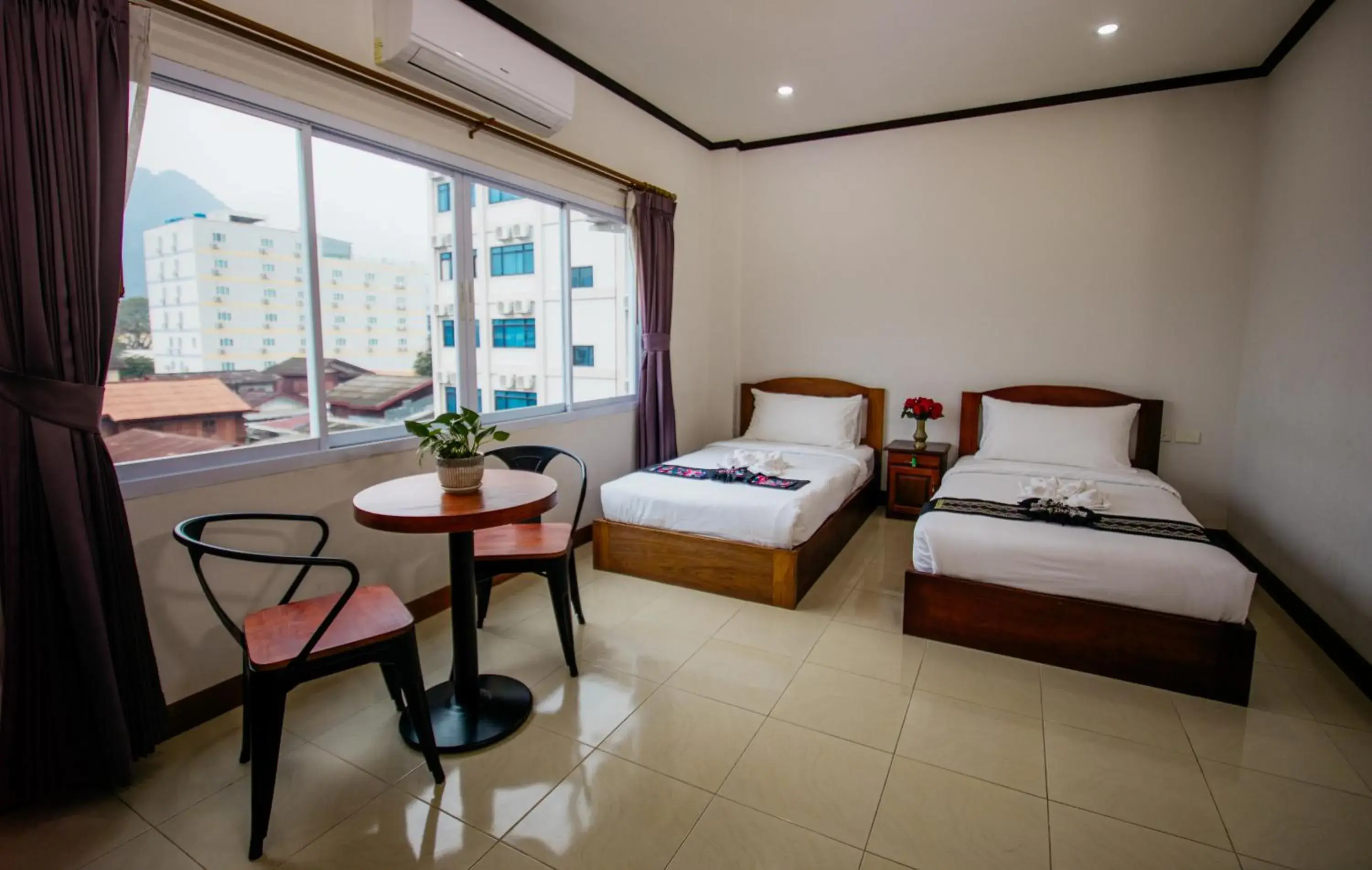 Standard Twin Room in Sisombat Plaza Hotel Standard Twin Room in Sisombat Plaza Hotel