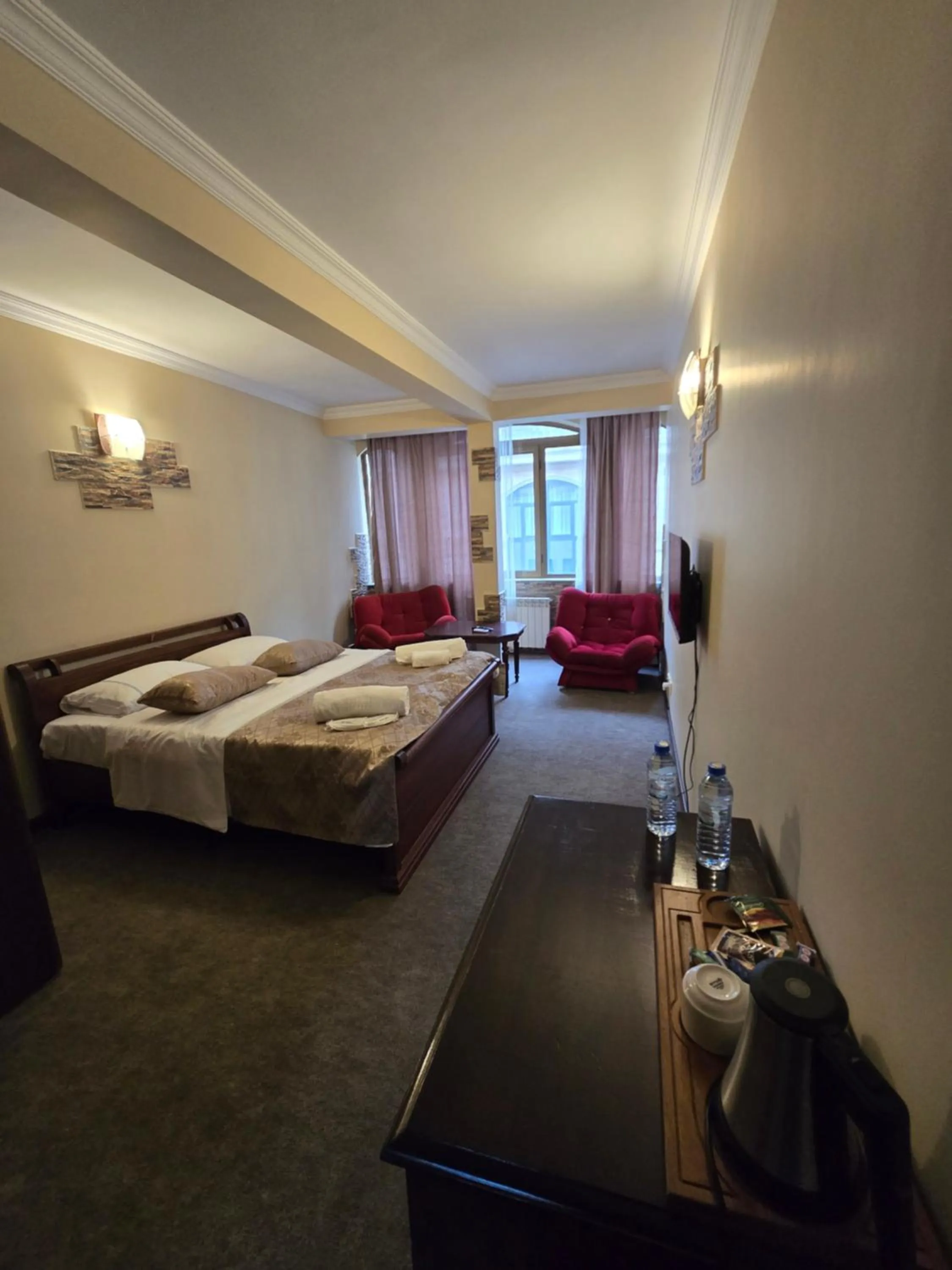 Bed in Ritsa Boutique Hotel