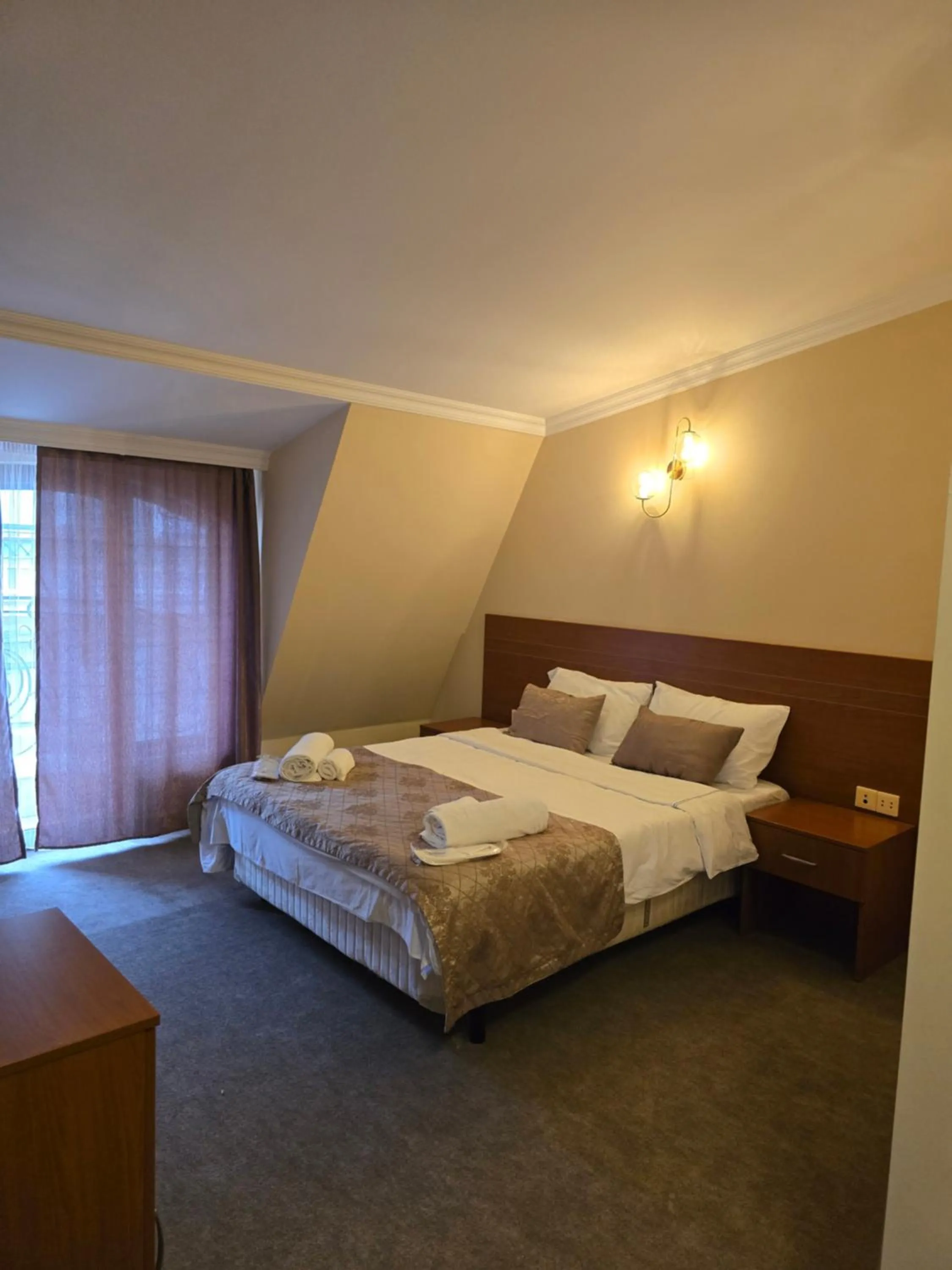 Bed in Ritsa Boutique Hotel