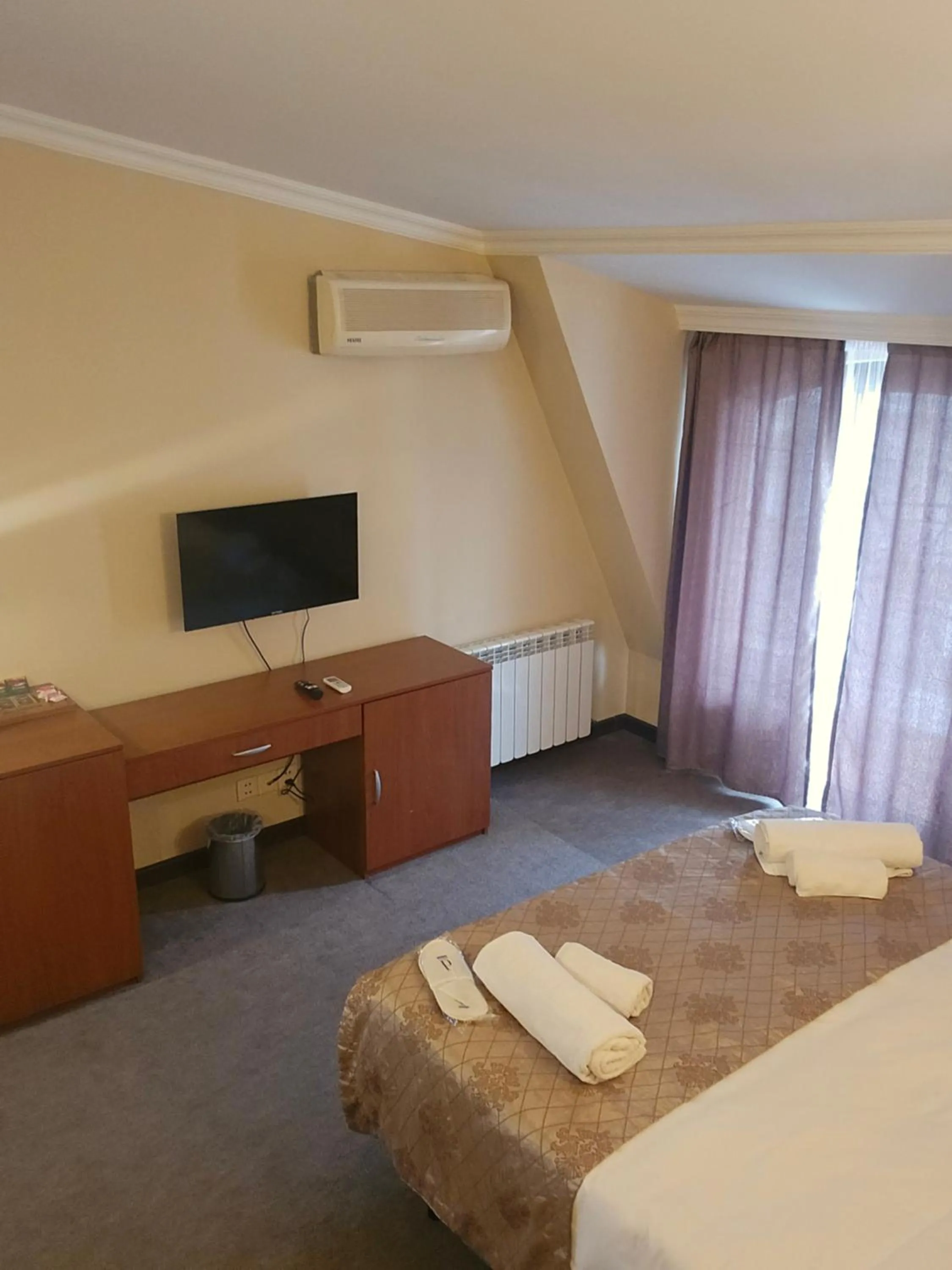 Bed in Ritsa Boutique Hotel