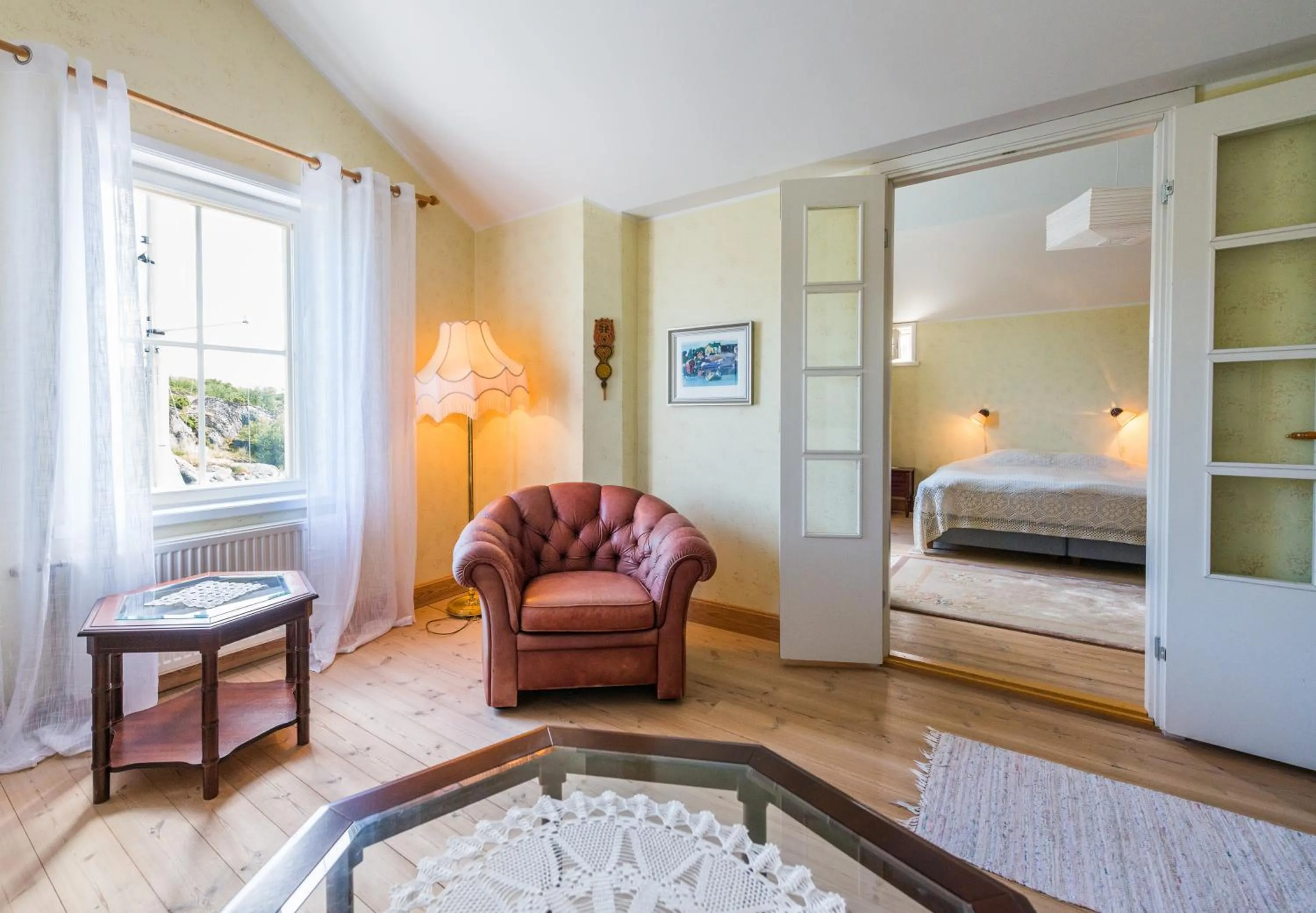 Living room, Bed in Brudhäll Hotel & Restaurant