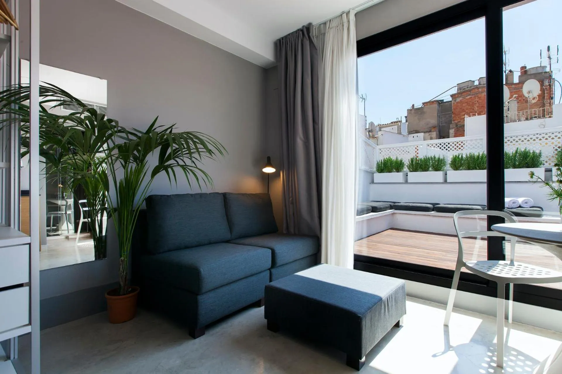 Living room in Kare No Apartments by Sitges Group