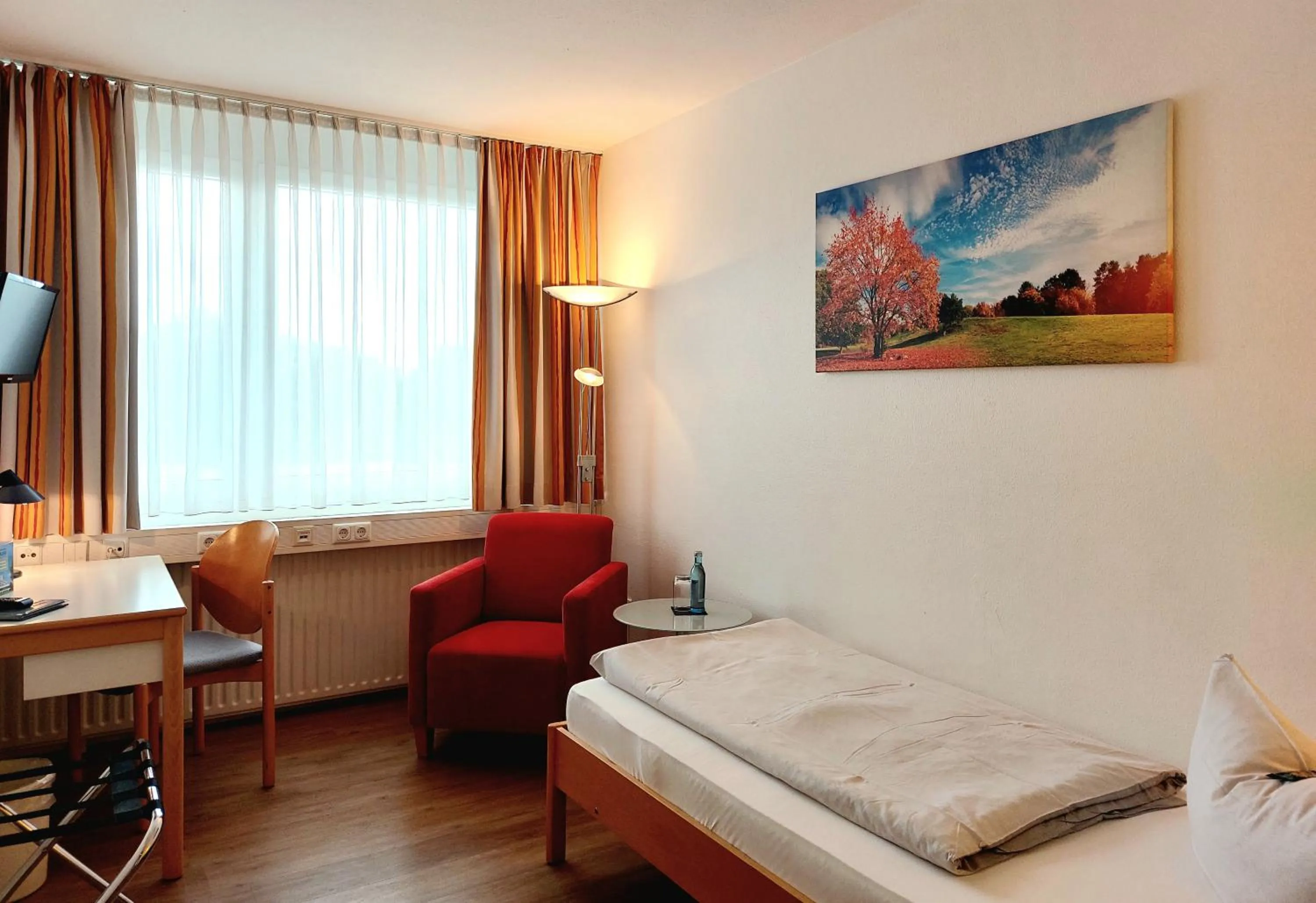 Photo of the whole room, Bed in Heinrich Pesch Hotel