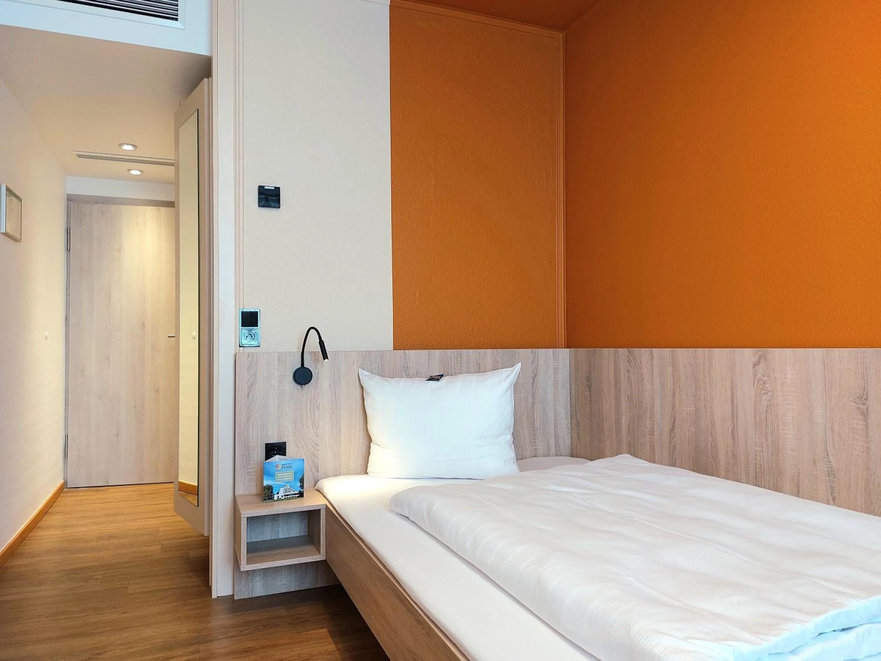 Photo of the whole room, Bed in Heinrich Pesch Hotel