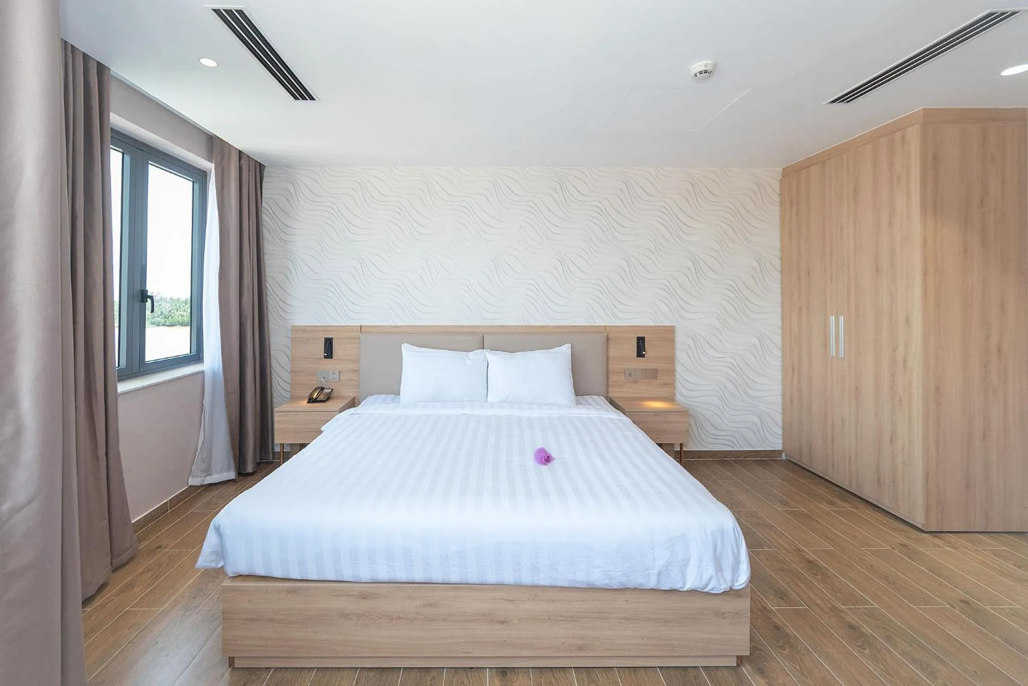 Bed in Bamboo Riverside Boutique Hotel