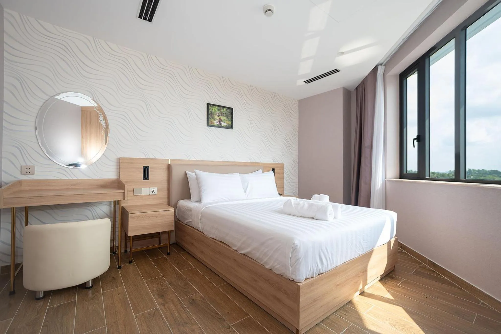 Bed in Bamboo Riverside Boutique Hotel