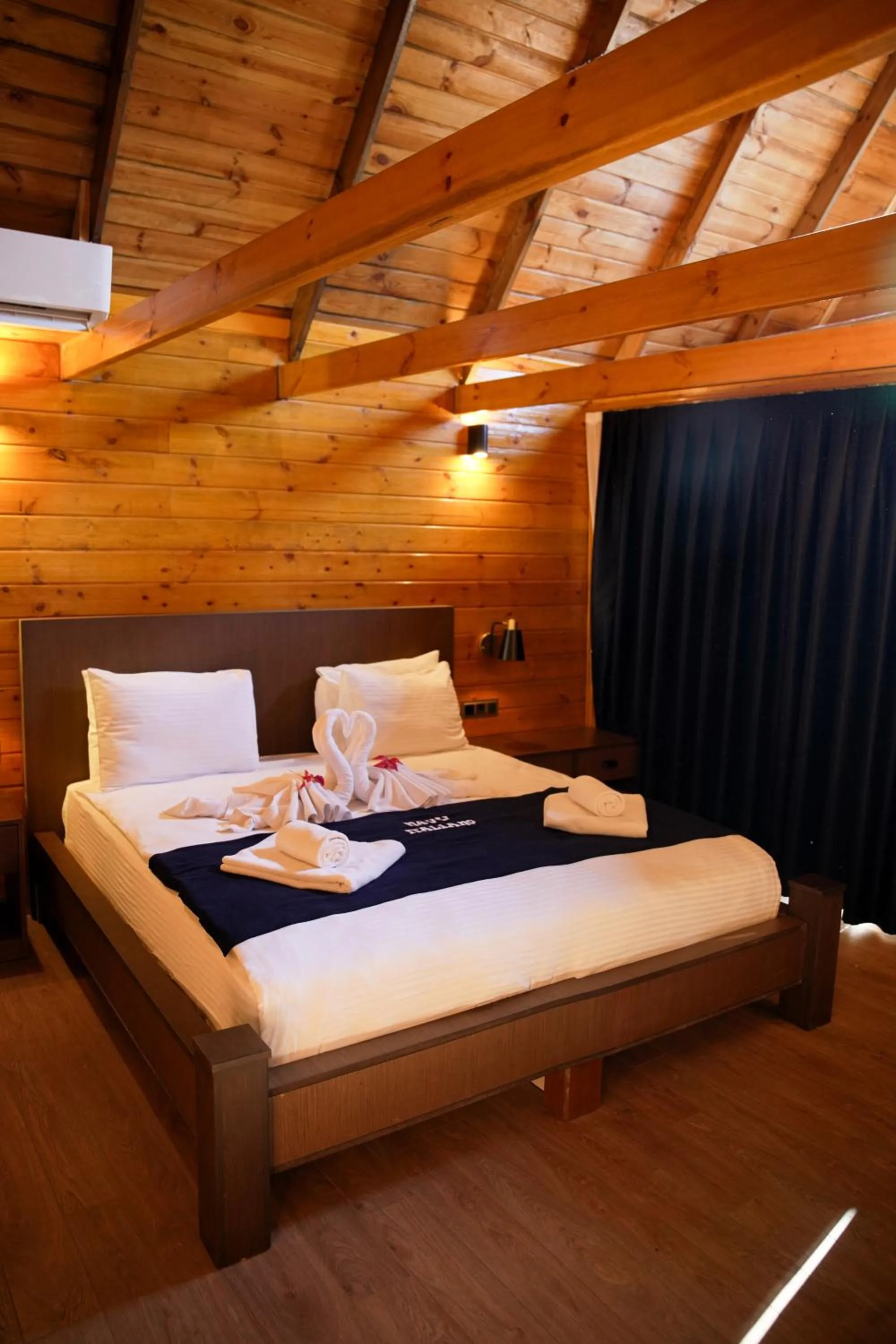 Photo of the whole room, Bed in Navy Inn & Bungalows