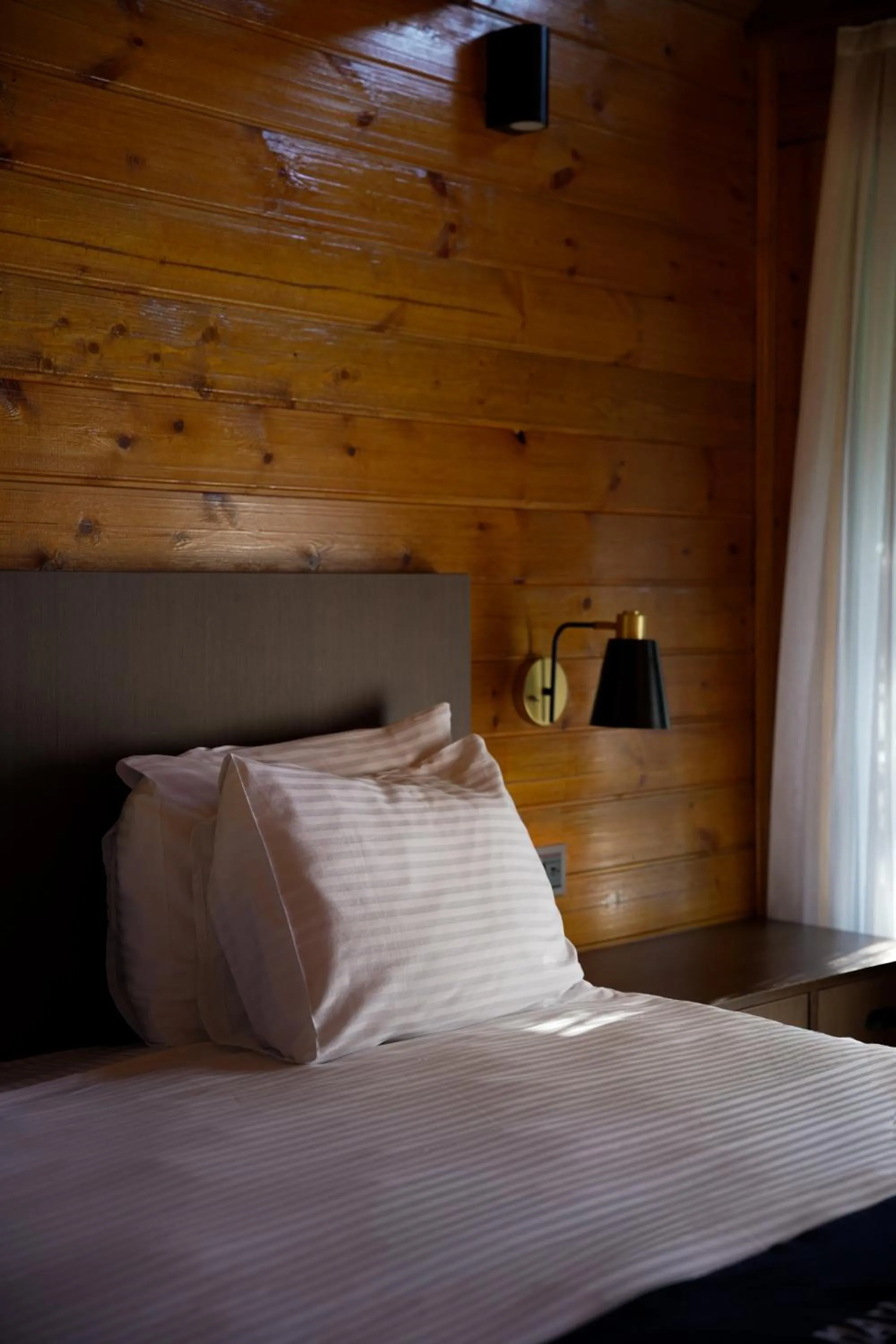 Bed in Navy Inn & Bungalows