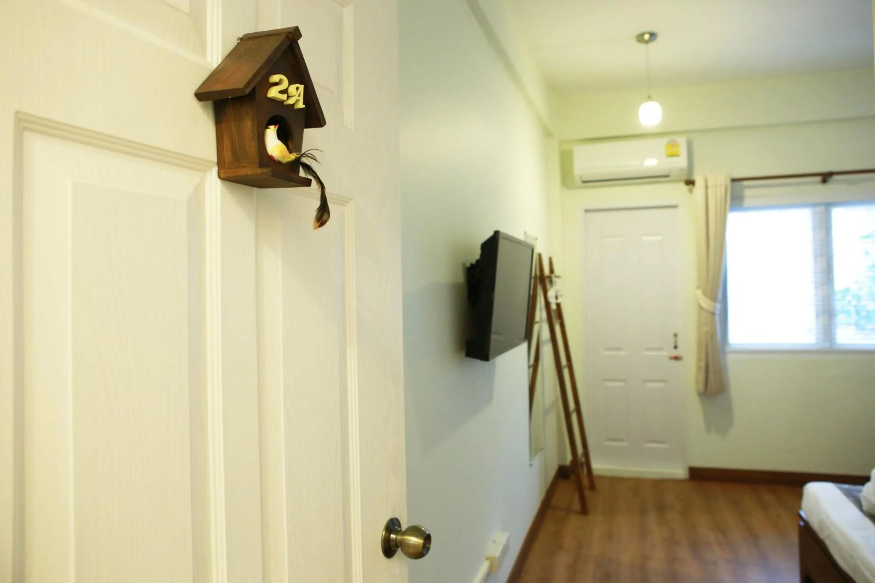 Decorative detail, TV/Entertainment Center in Tini Kati Hostel
