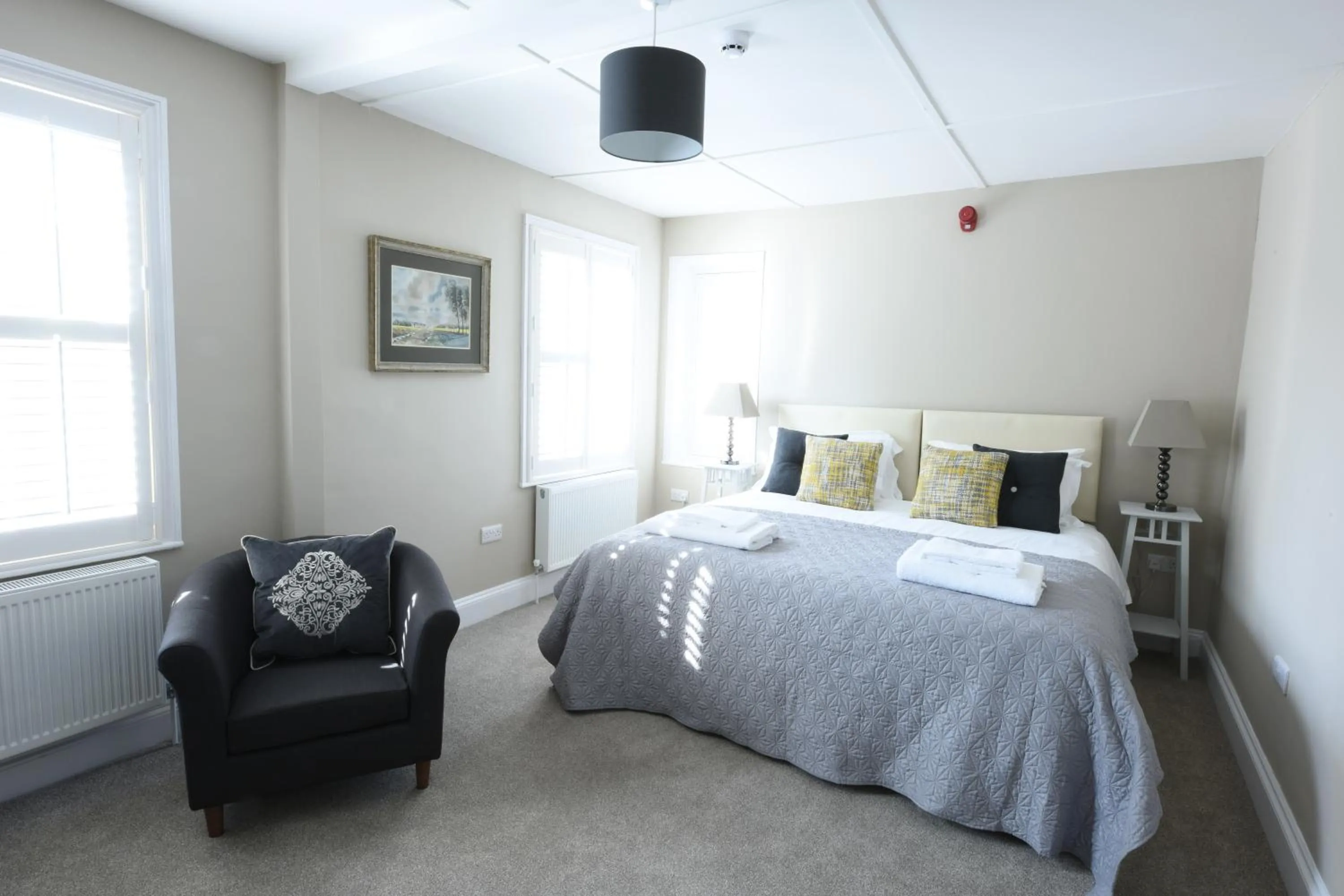 Bed in Woodstock Suites