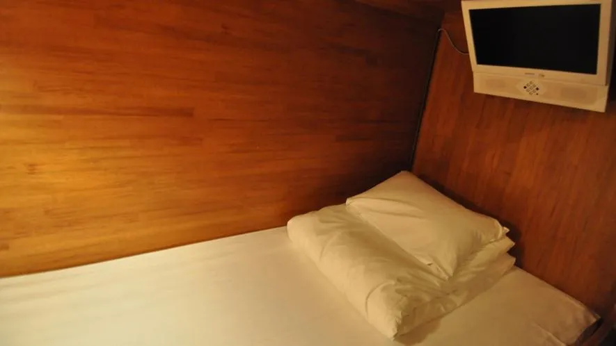 Bed in New Gloria Oita Hotel