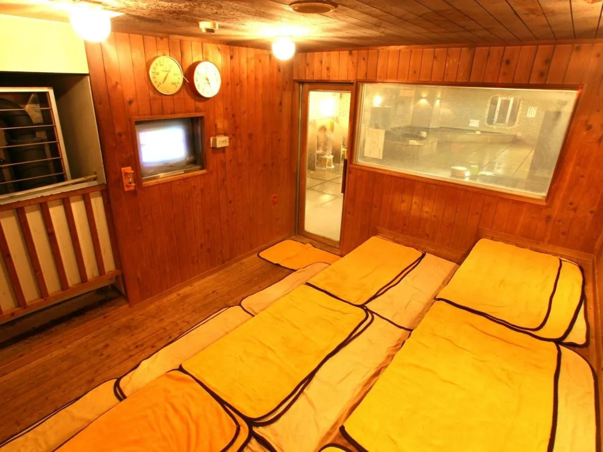 Bed in New Gloria Oita Hotel