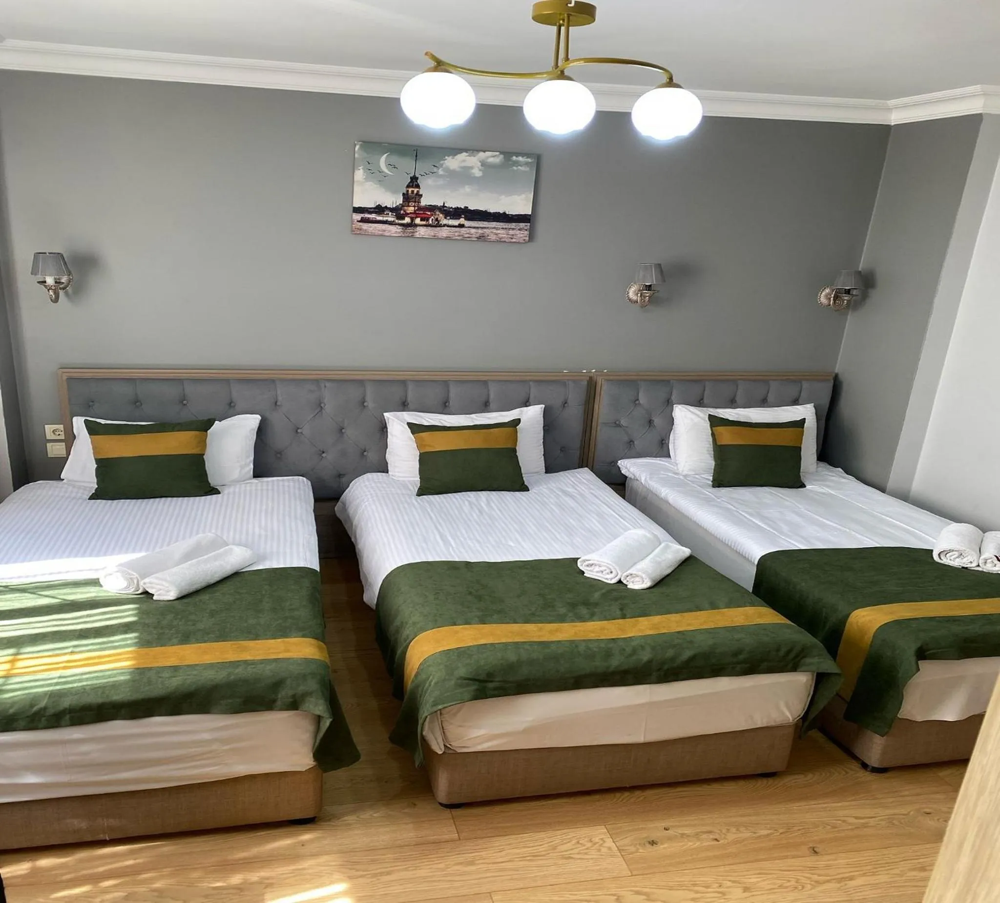 Bed in Unique Suite Hotel