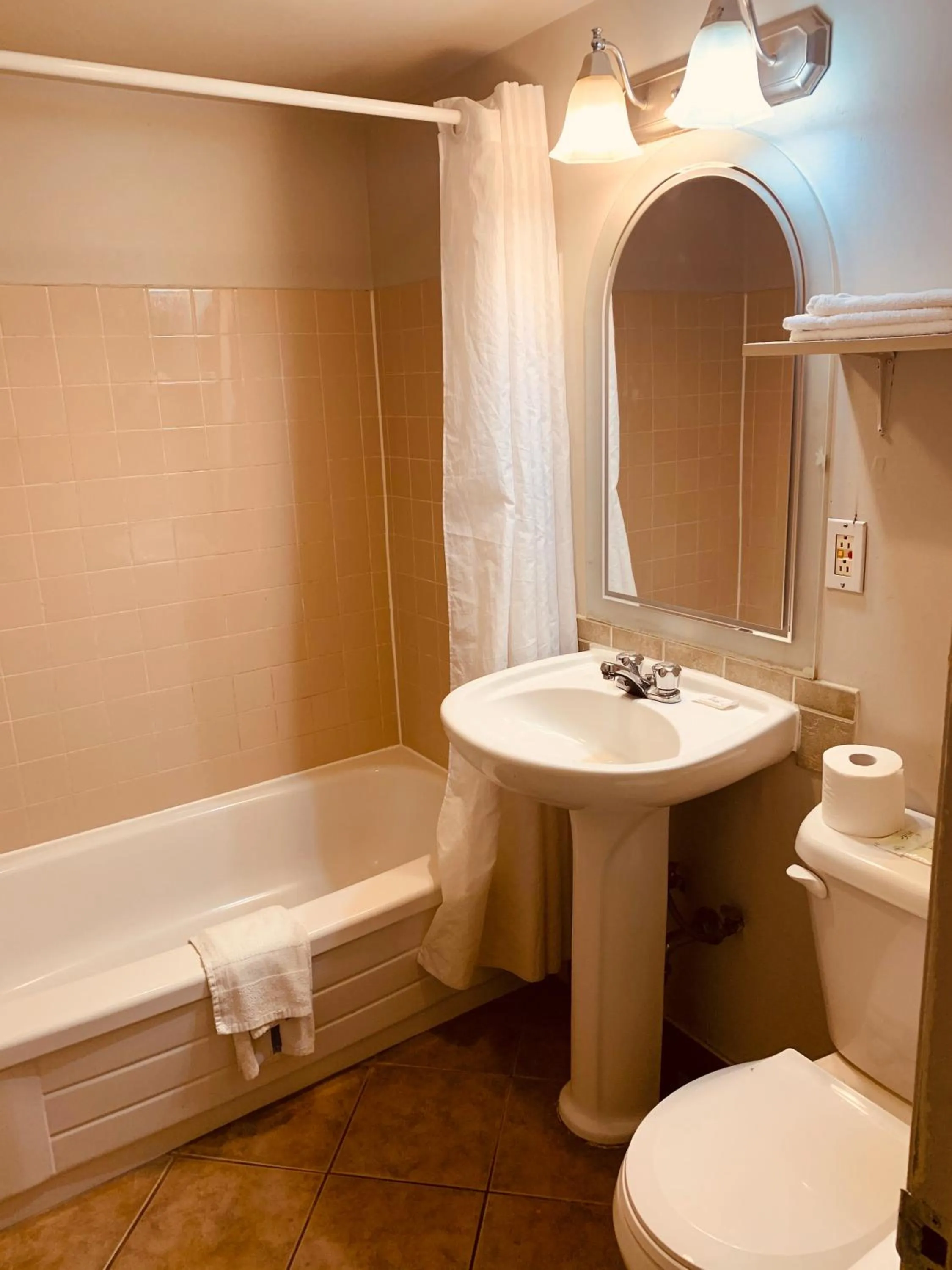 Bathroom in Red Carpet Inn & Suites