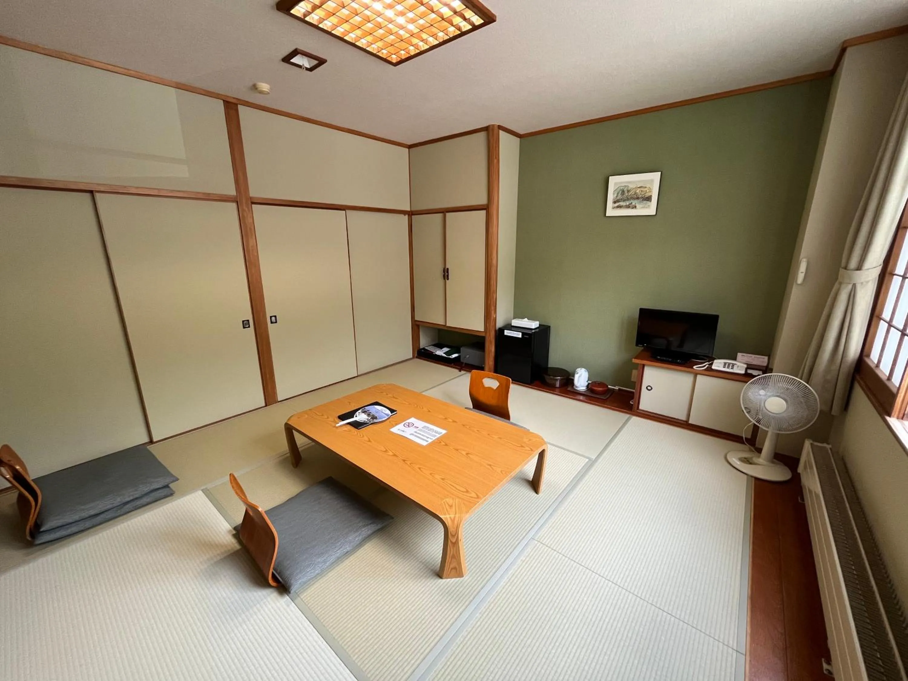 Living room in Sapporo's Secret Onsen Sanctuary Marukoma Onsen Ryokan