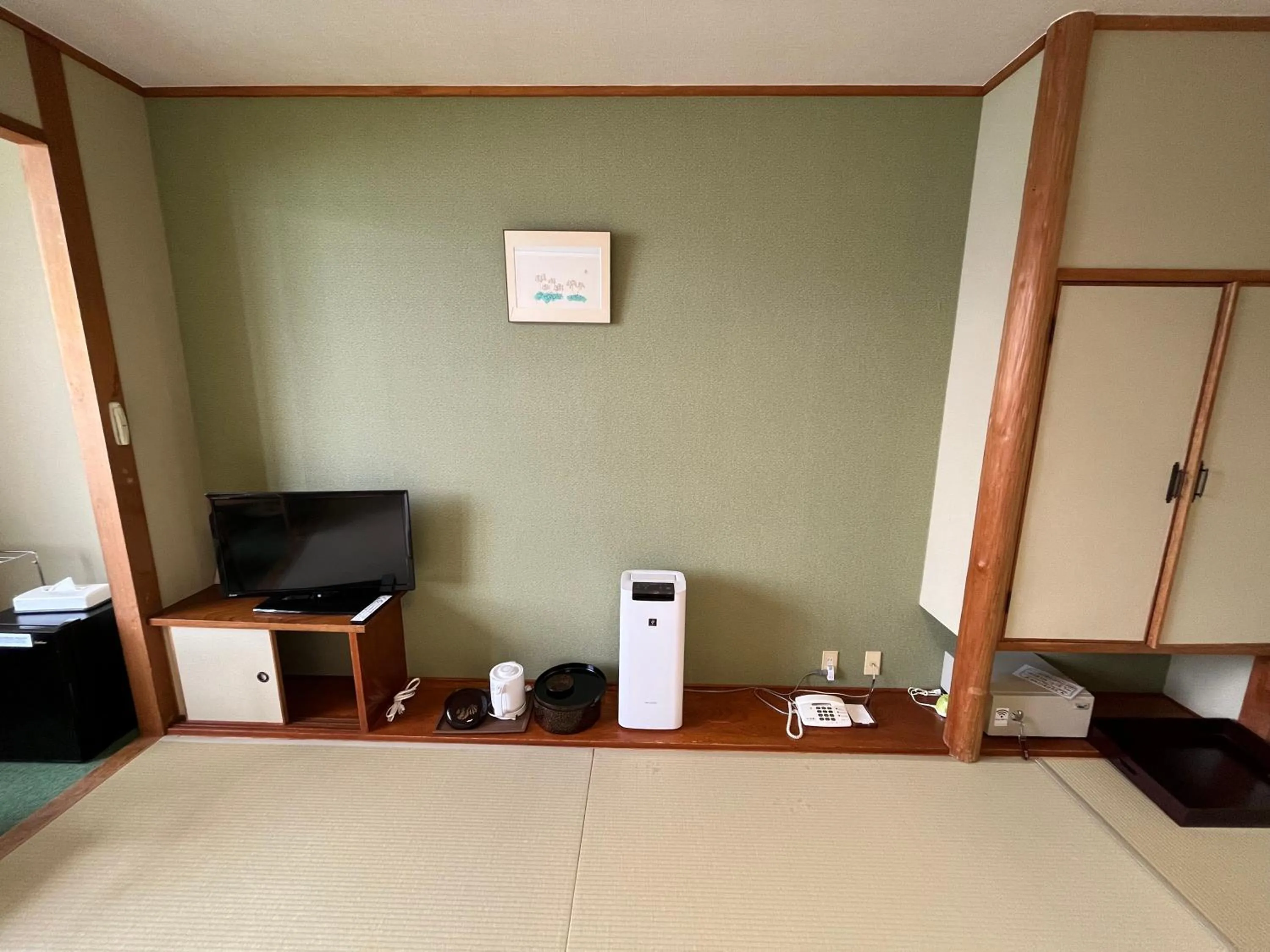 Communal lounge/ TV room in Sapporo's Secret Onsen Sanctuary Marukoma Onsen Ryokan