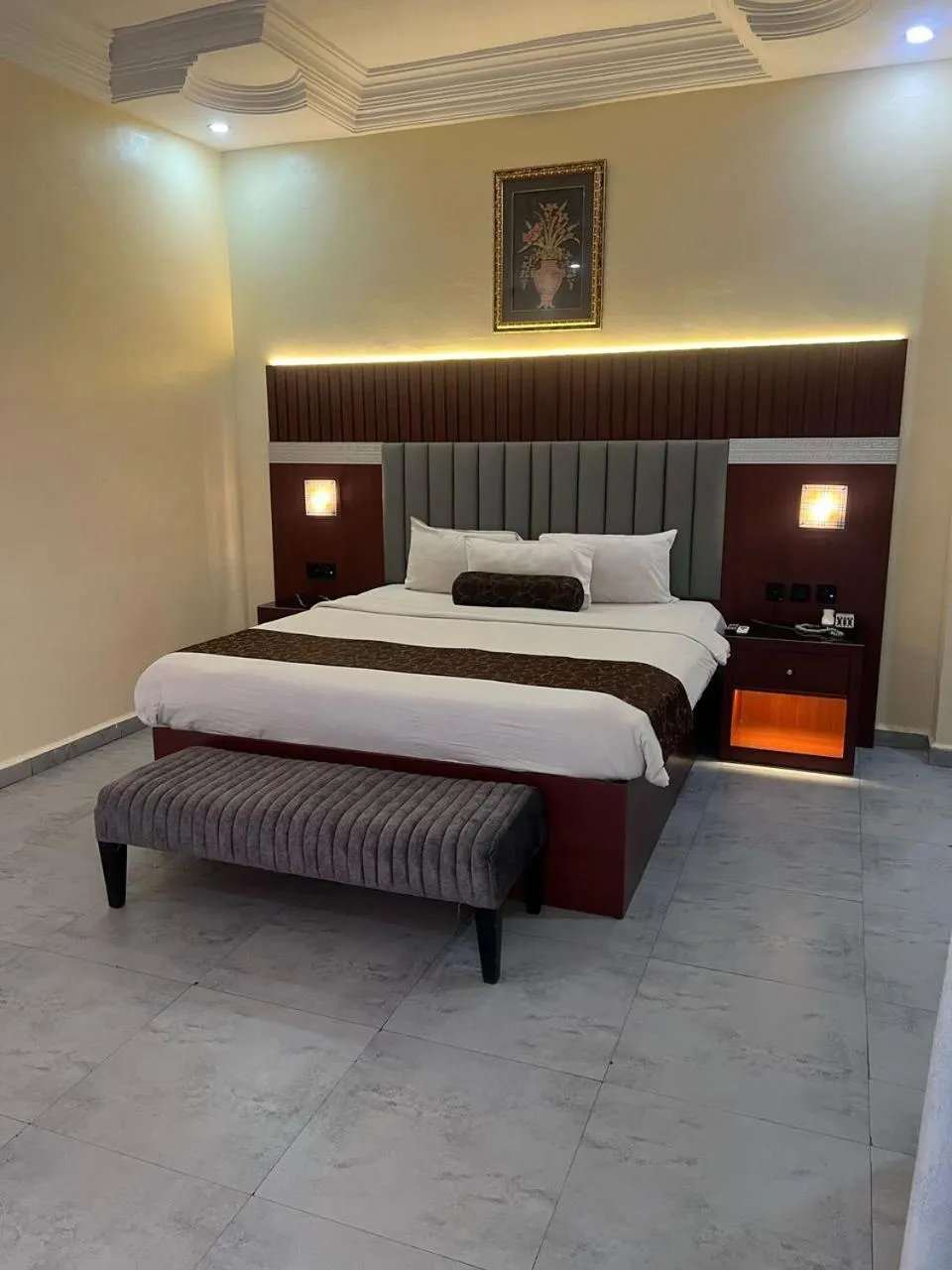 Bed in Nippon Grand Hotel and Apartment