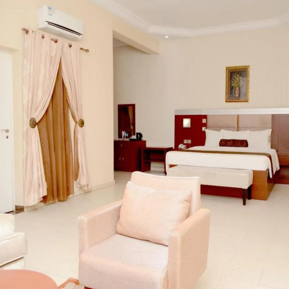 Bed in Nippon Grand Hotel and Apartment