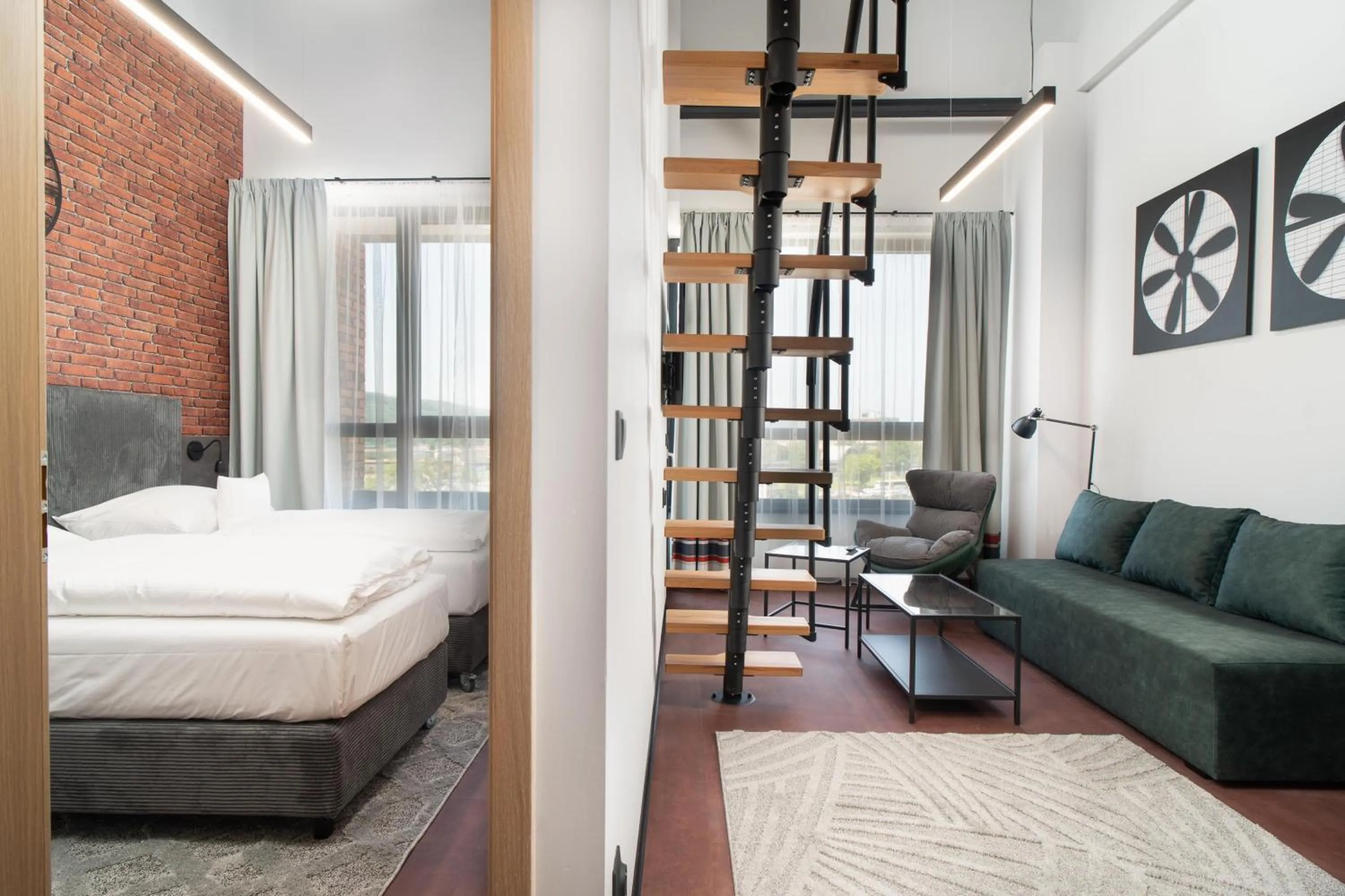 Two-Bedroom Loft Apartment with One Double and Two Single Beds, Sofa Bed and Balcony in Best Western Hotel Presov