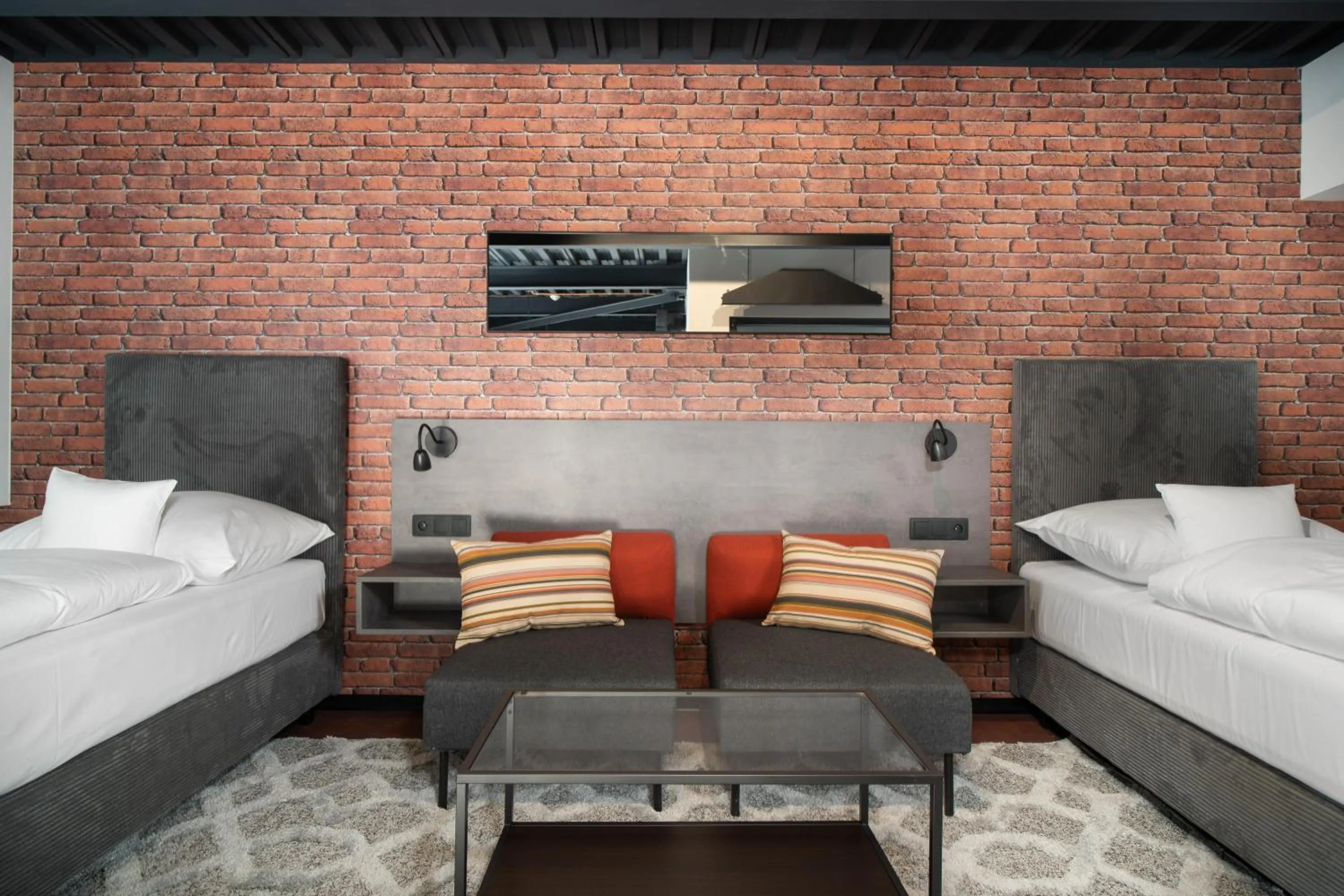 Two-Bedroom Loft Apartment with One Double and Two Single Beds, Sofa Bed and Balcony in Best Western Hotel Presov