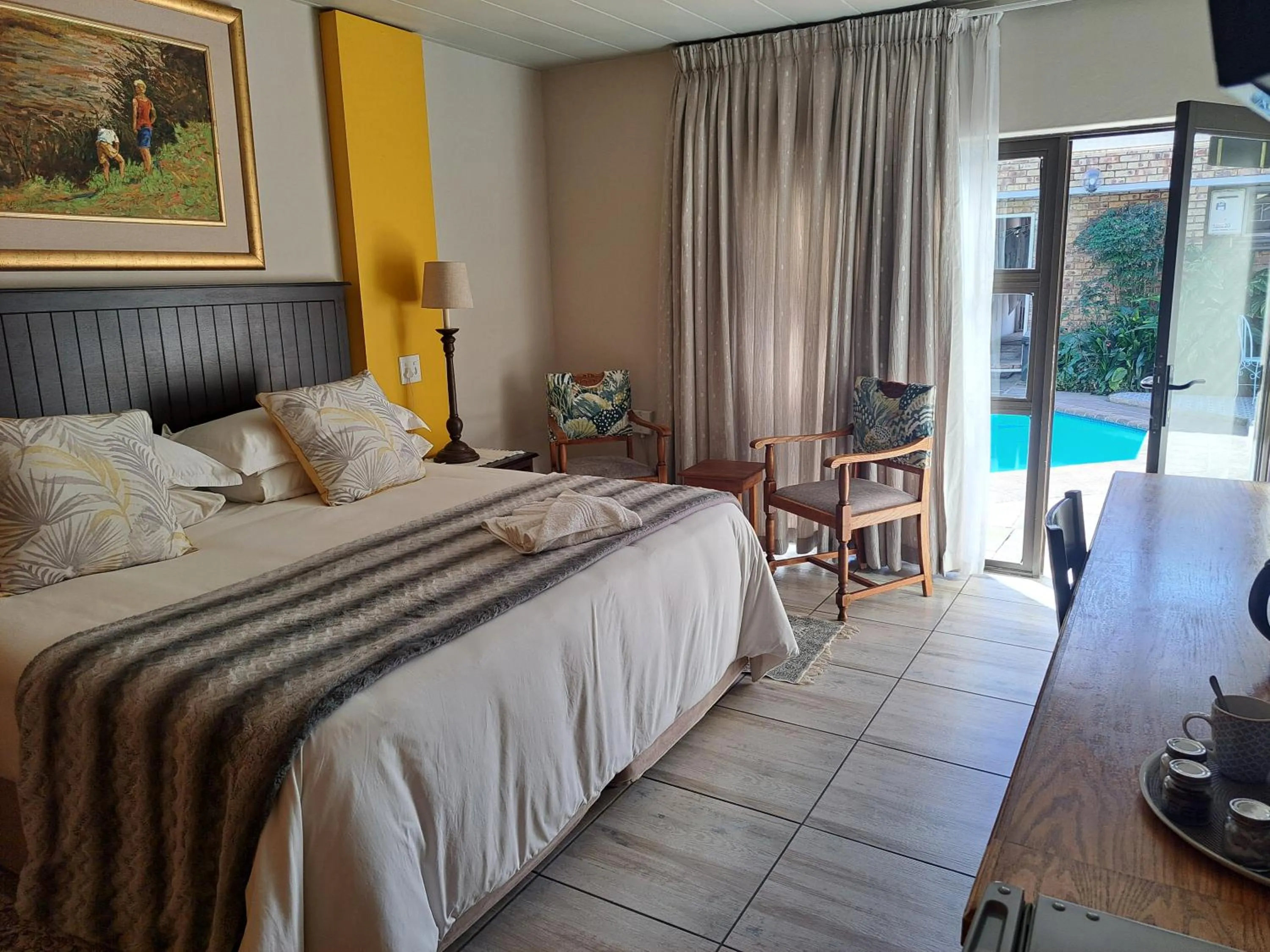 Bed in Dormio Manor Guest Lodge