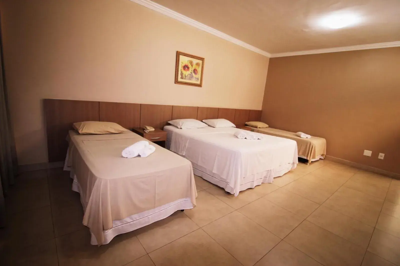 Deluxe Quadruple Room - single occupancy in Hotel Regina Muriaé Deluxe Quadruple Room - single occupancy in Hotel Regina Muriaé