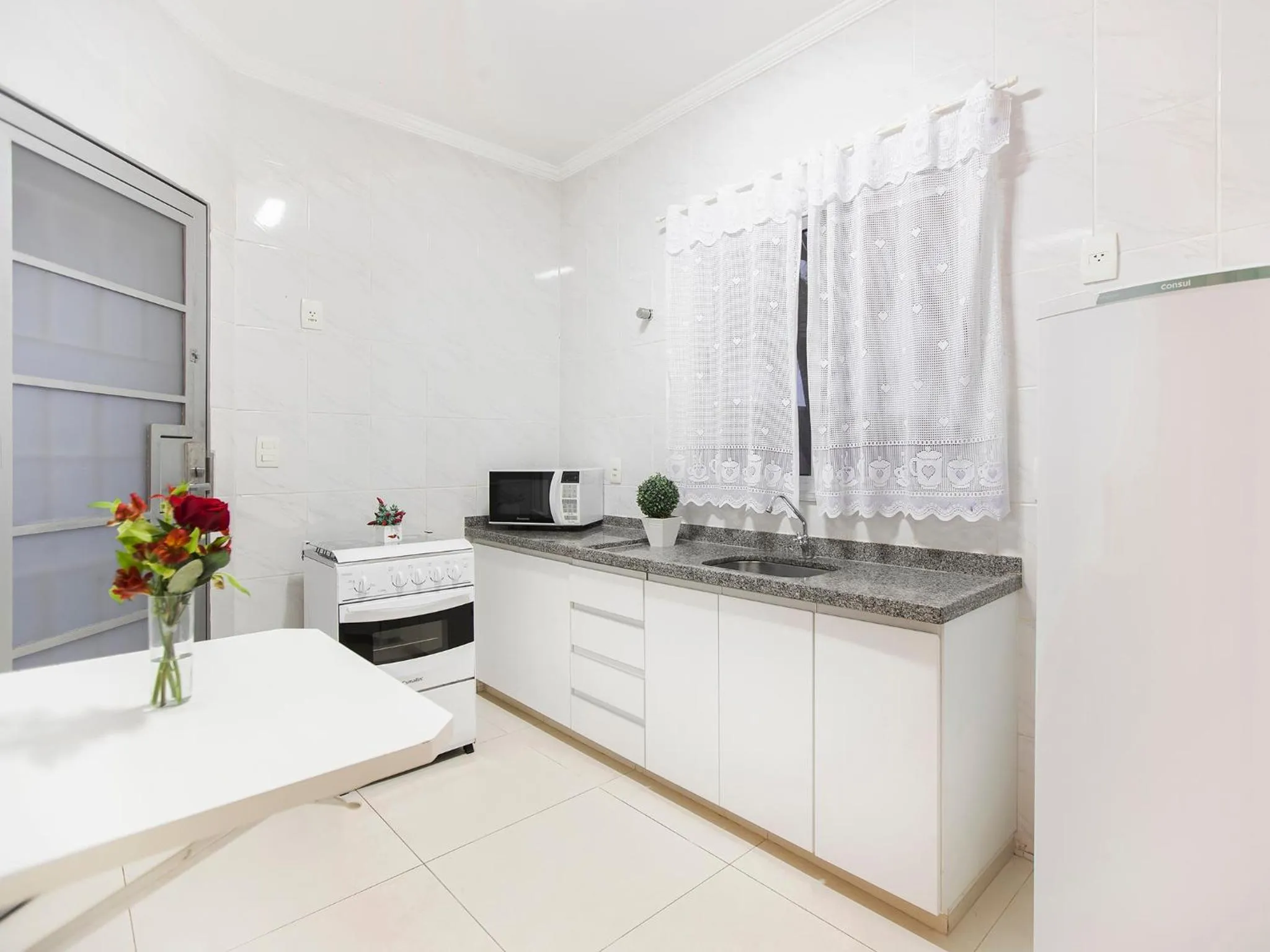 Kitchen or kitchenette in Vinhedo Plaza Hotel