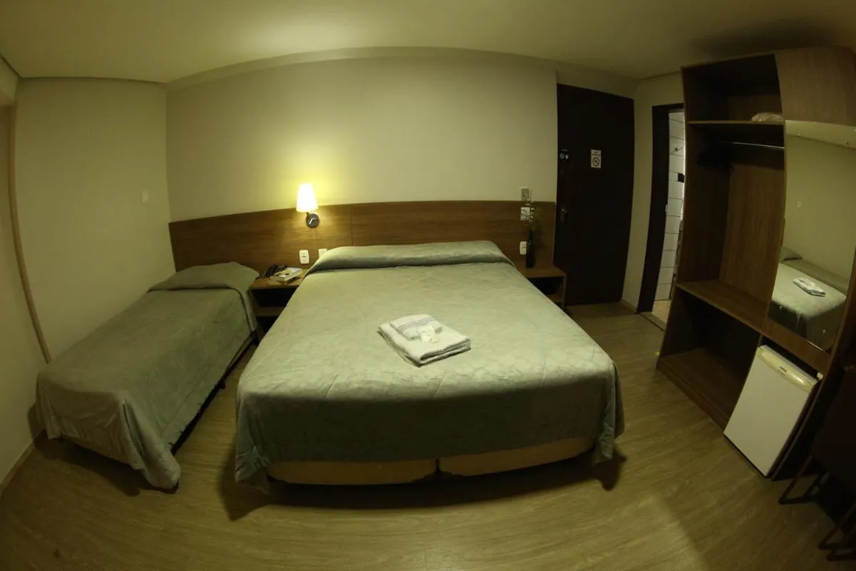 Bed in Hotel Dom Rafael Executivo