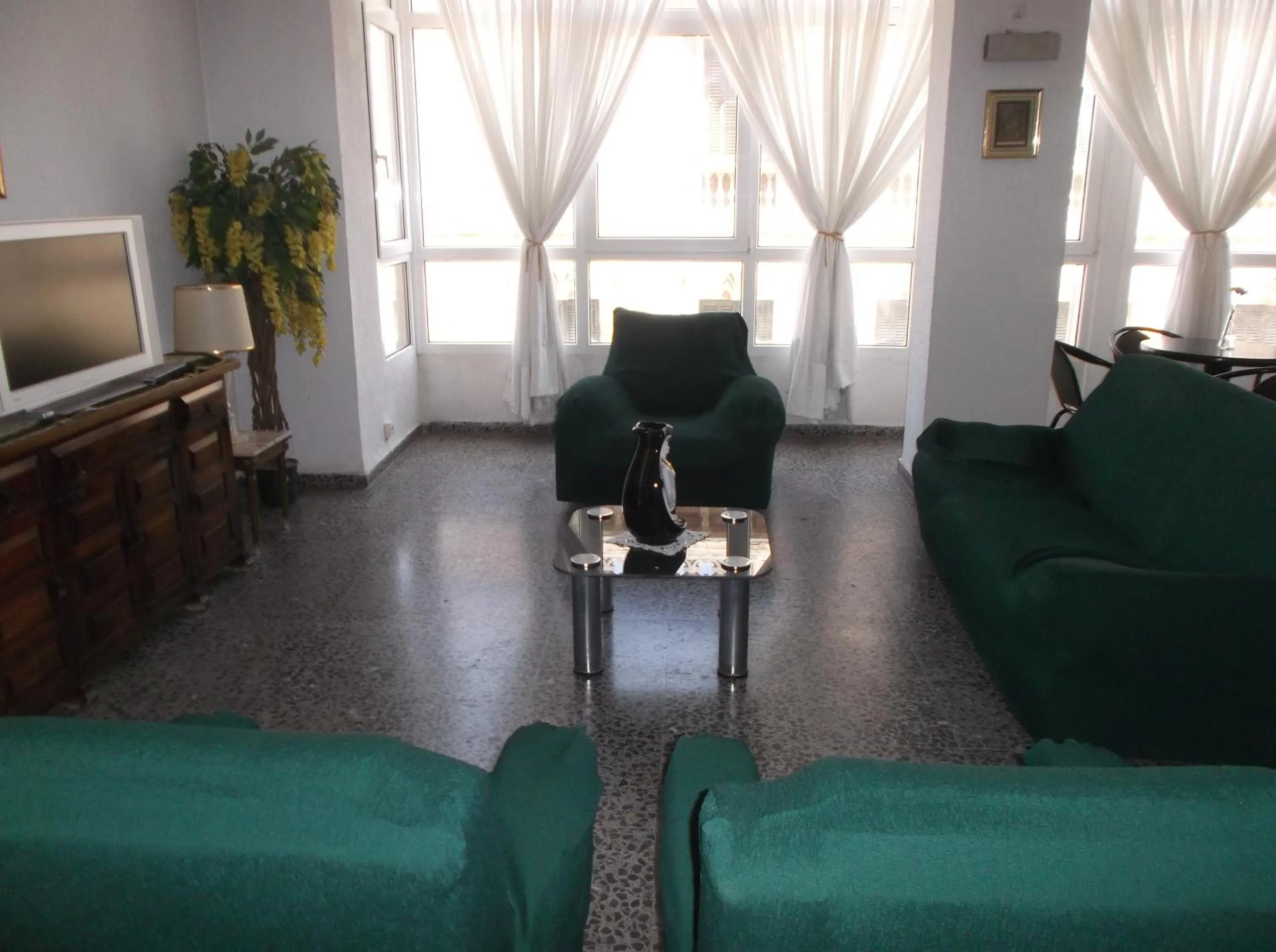 Communal lounge/ TV room in Hotel Lido