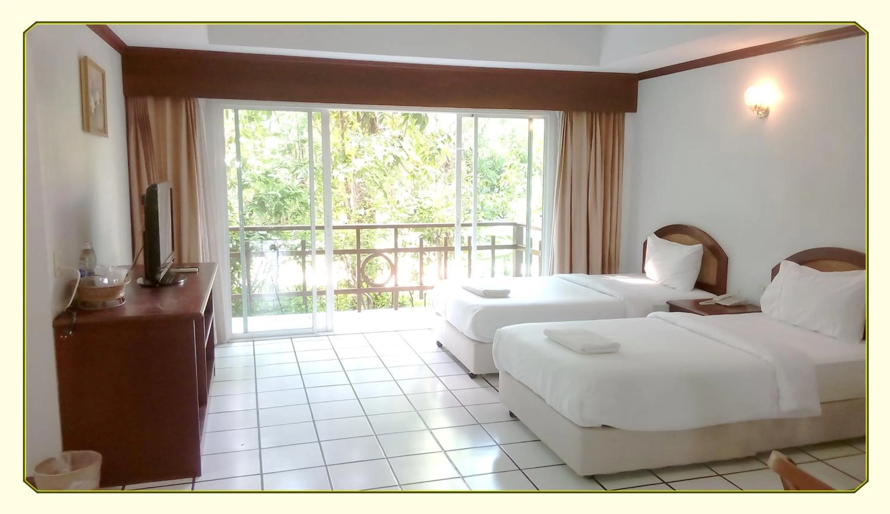 Bed in Thong Paeka Hotel