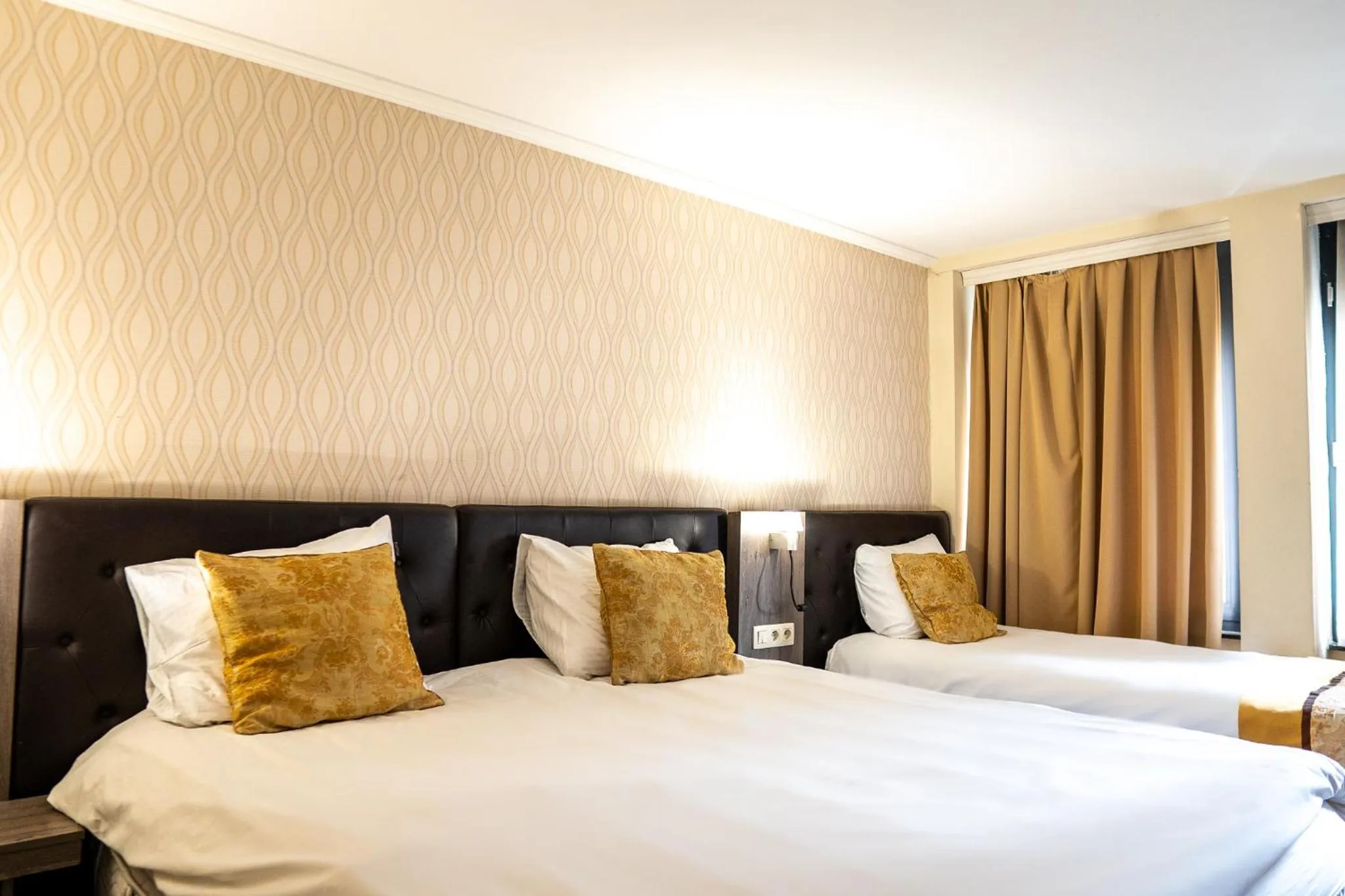 Bed in The Helmet Hotel