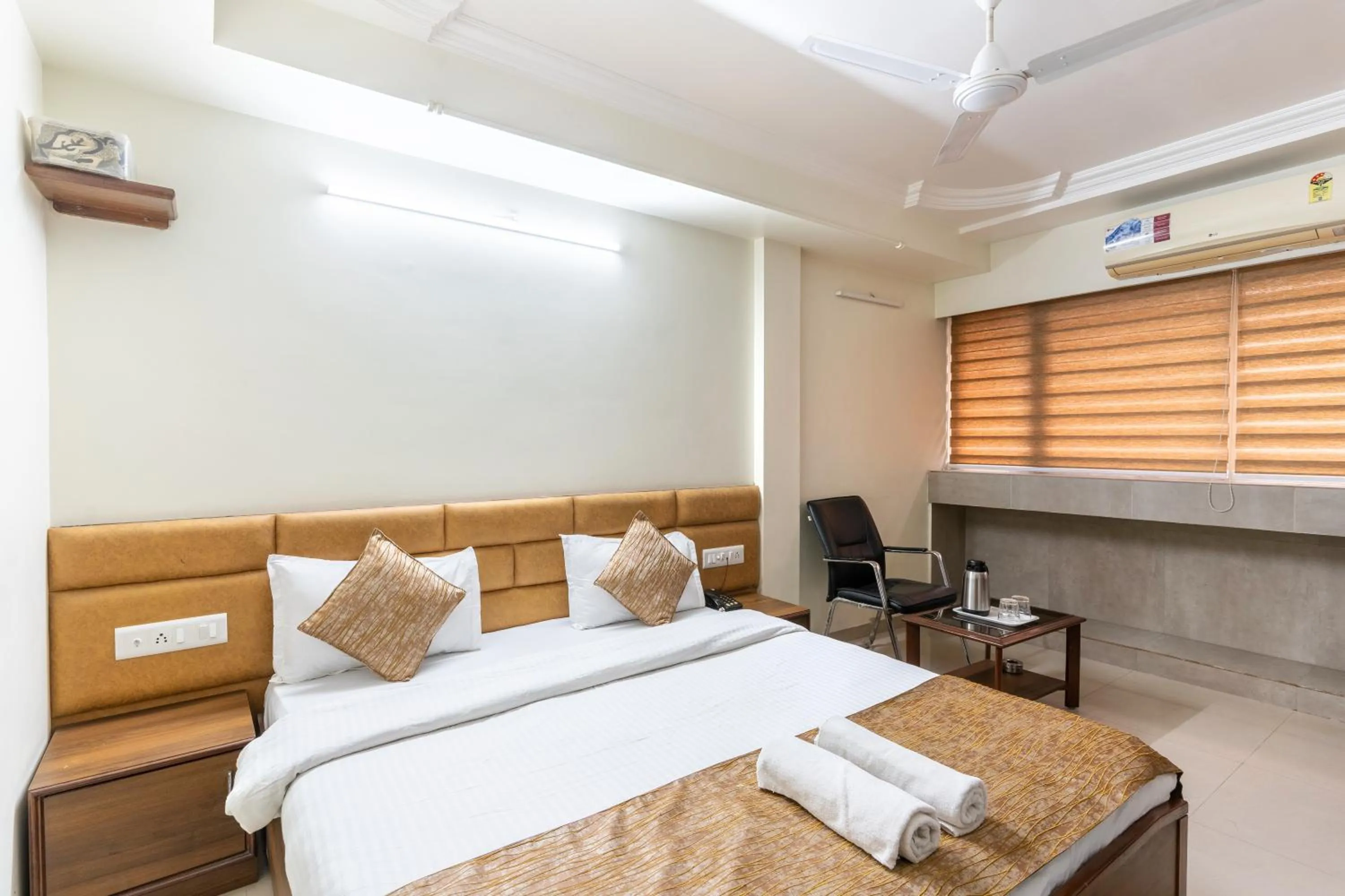 Bed in Hotel Sanmati