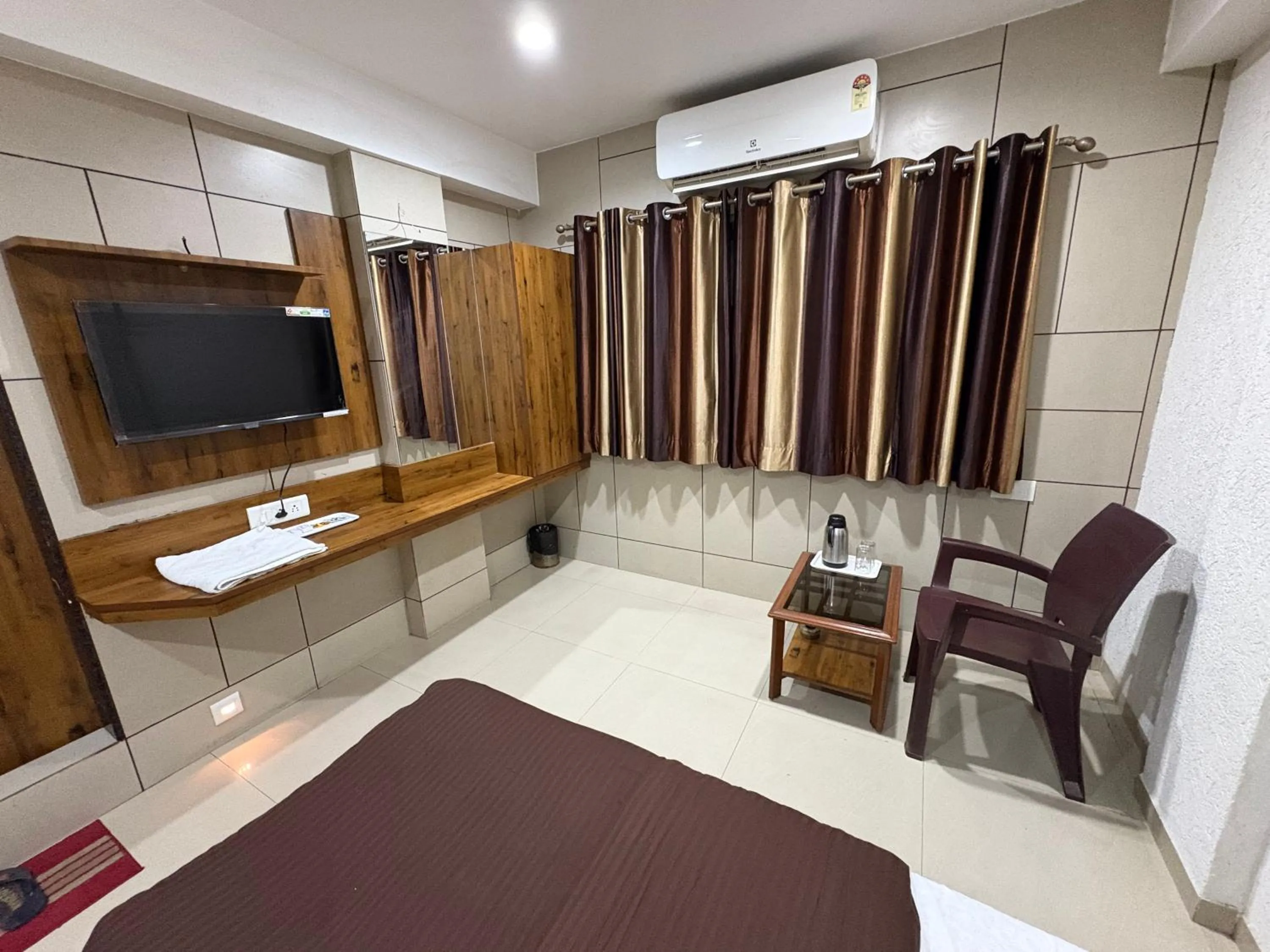 Bed in Hotel Sanmati