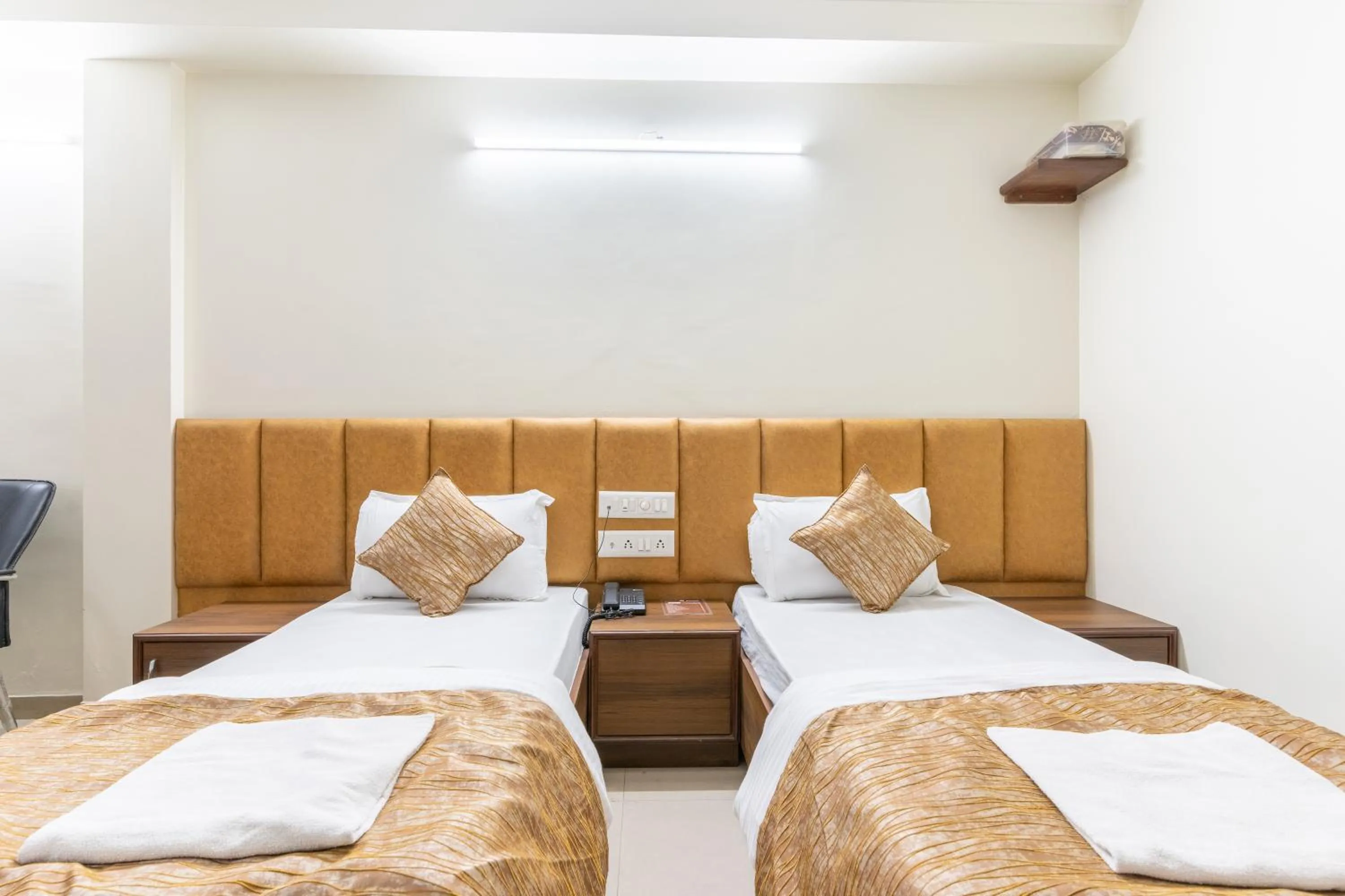 Bed in Hotel Sanmati