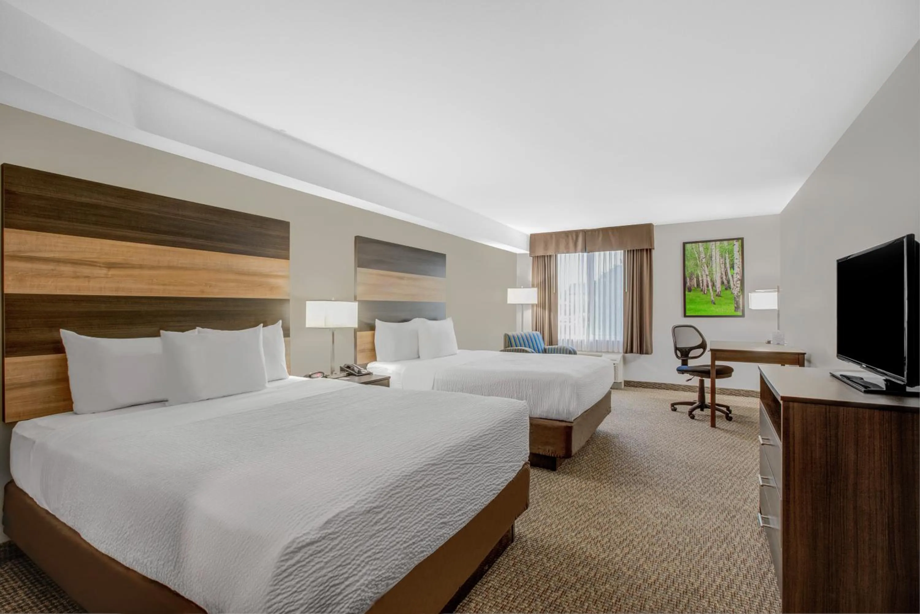 Bed in Days Inn & Suites by Wyndham Lindsay