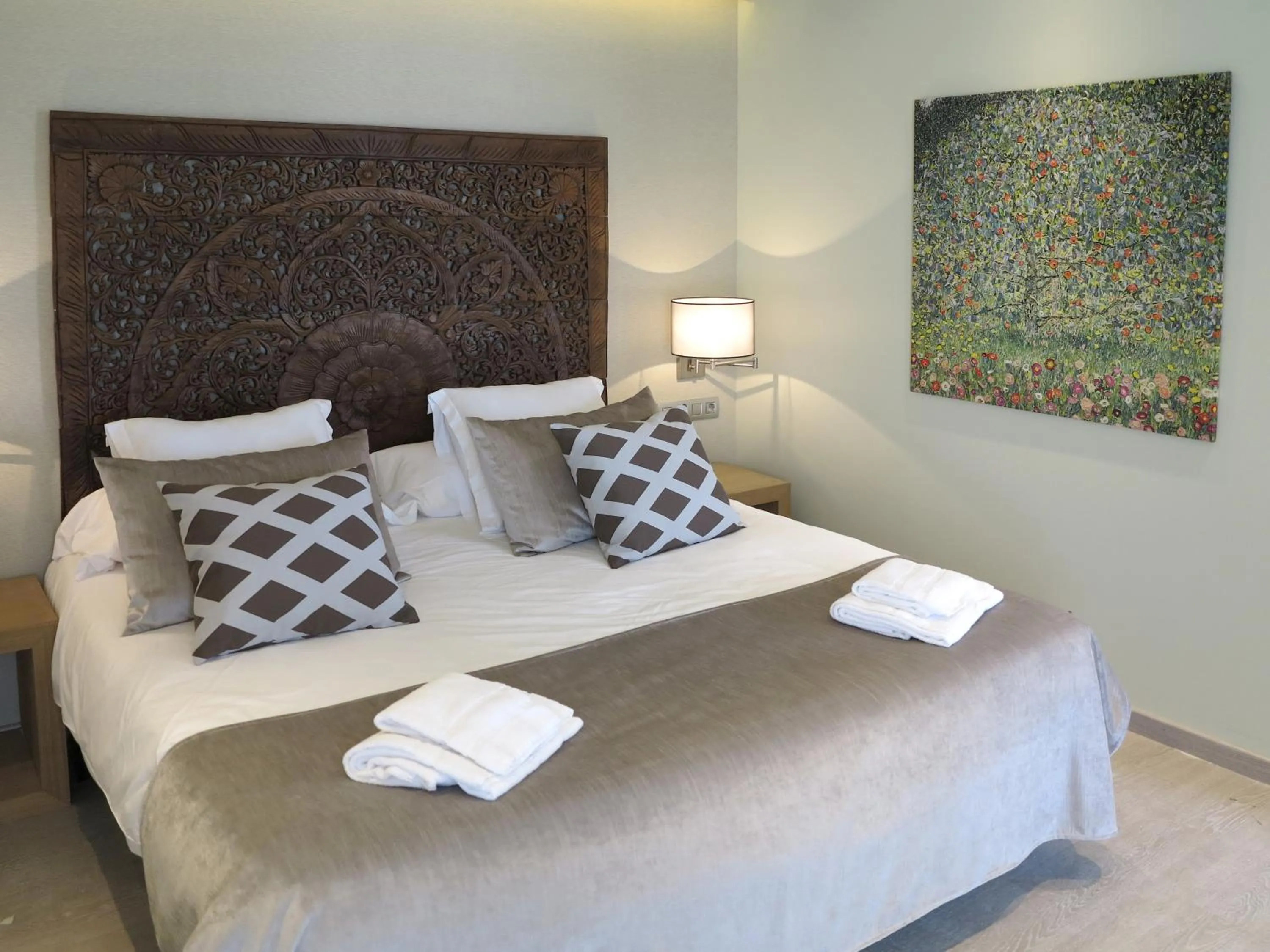 Bed in Serennia Exclusive Rooms