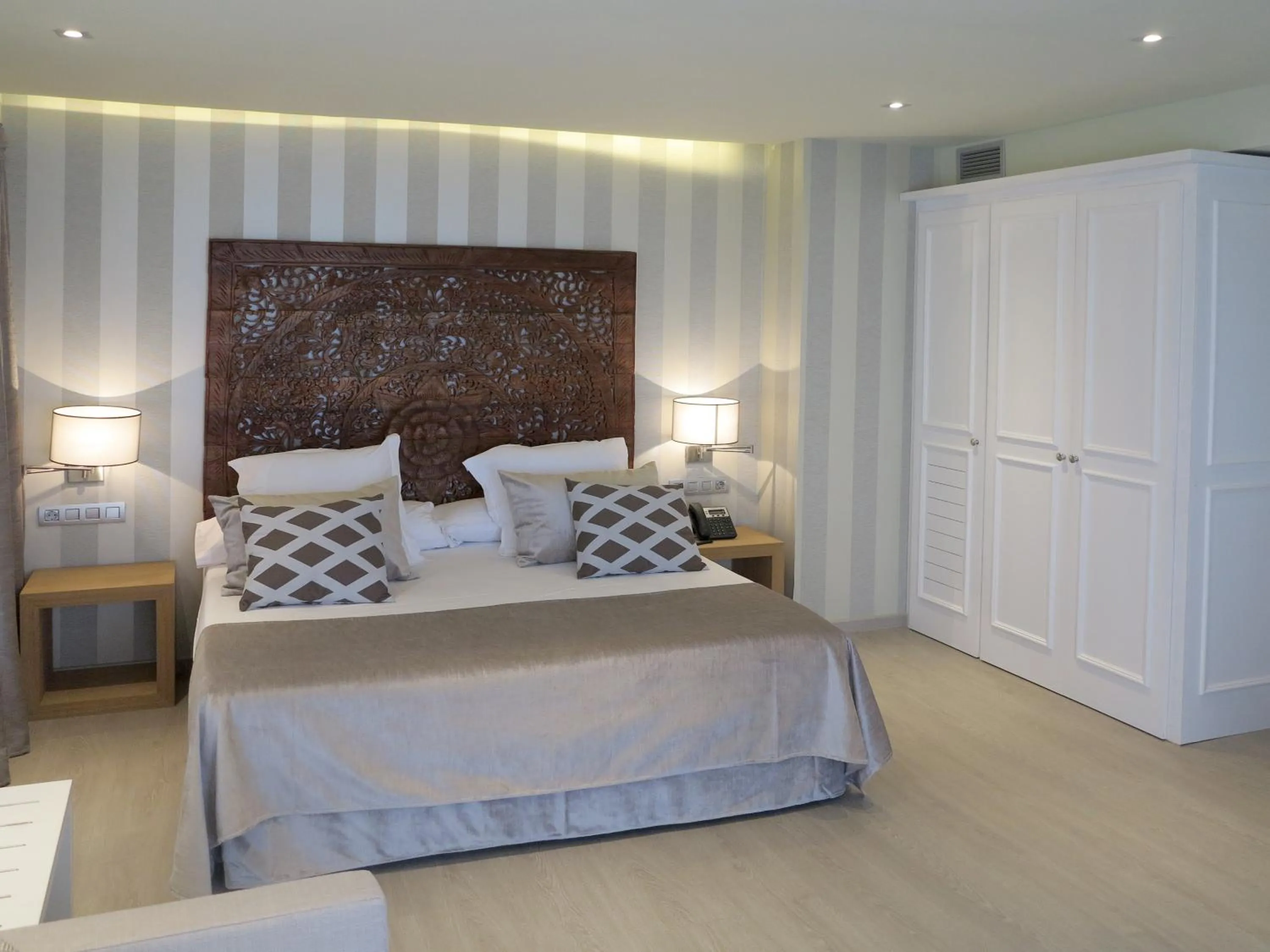 Bed in Serennia Exclusive Rooms